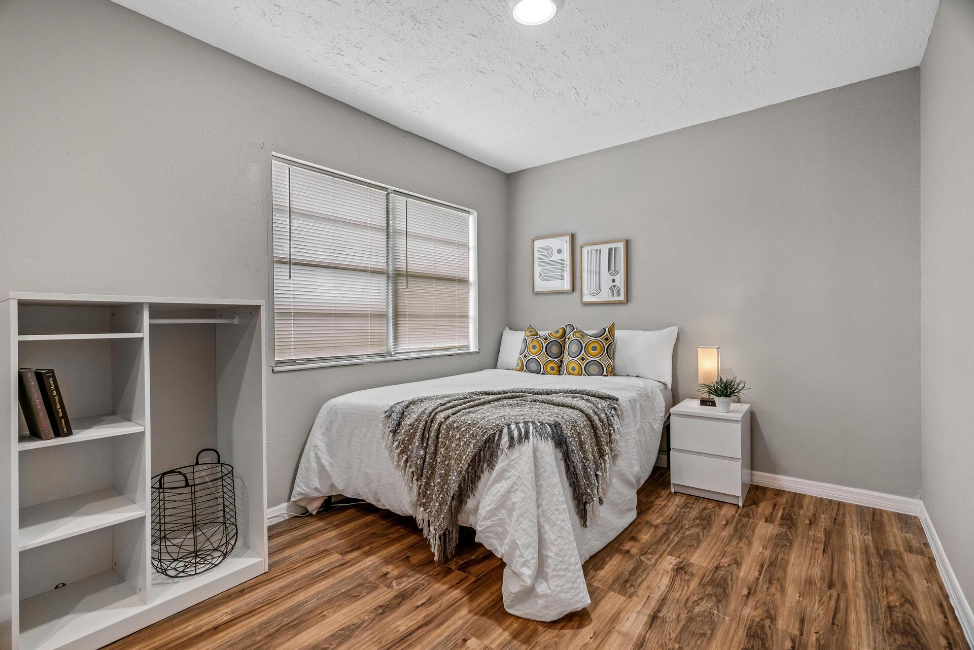 bedroom, detected: window blind, bed