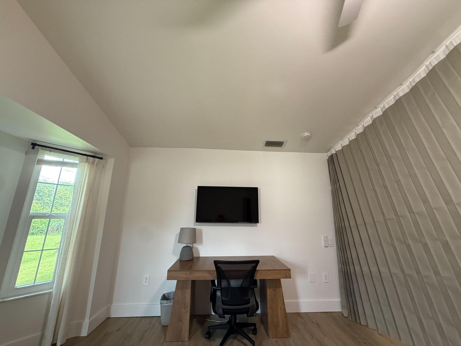 room has two small windows