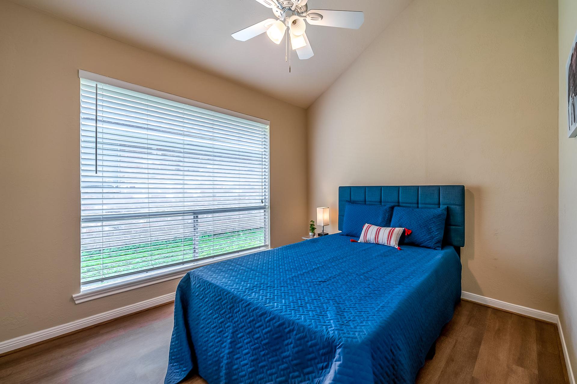 bedroom, detected: ceiling fan, window blind, bed