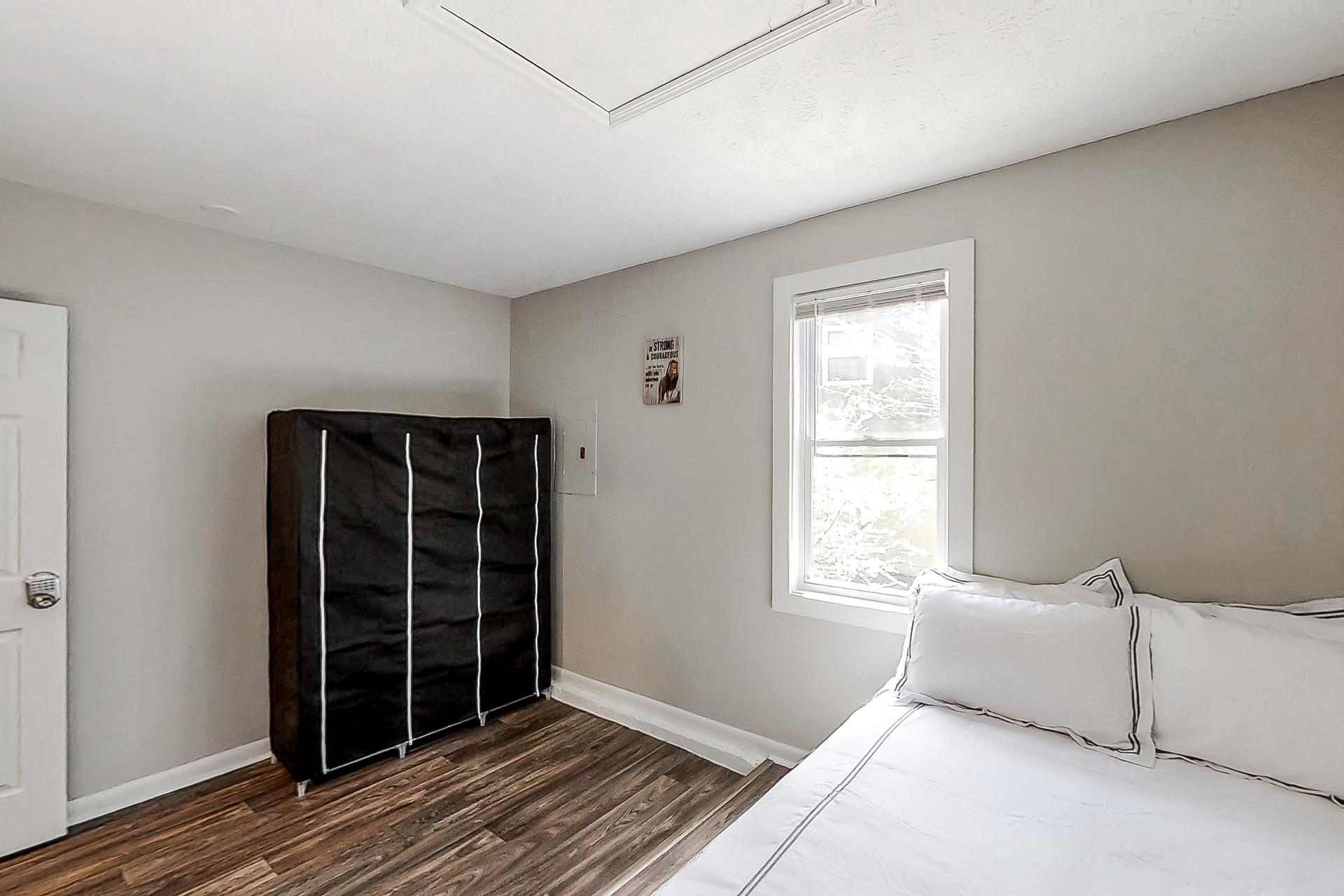 bedroom, detected: window blind, bed