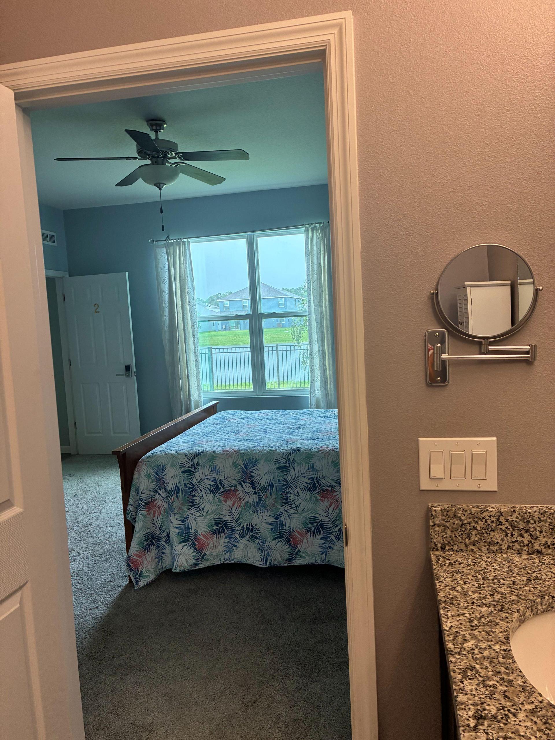 Room2: Bed and backyard view