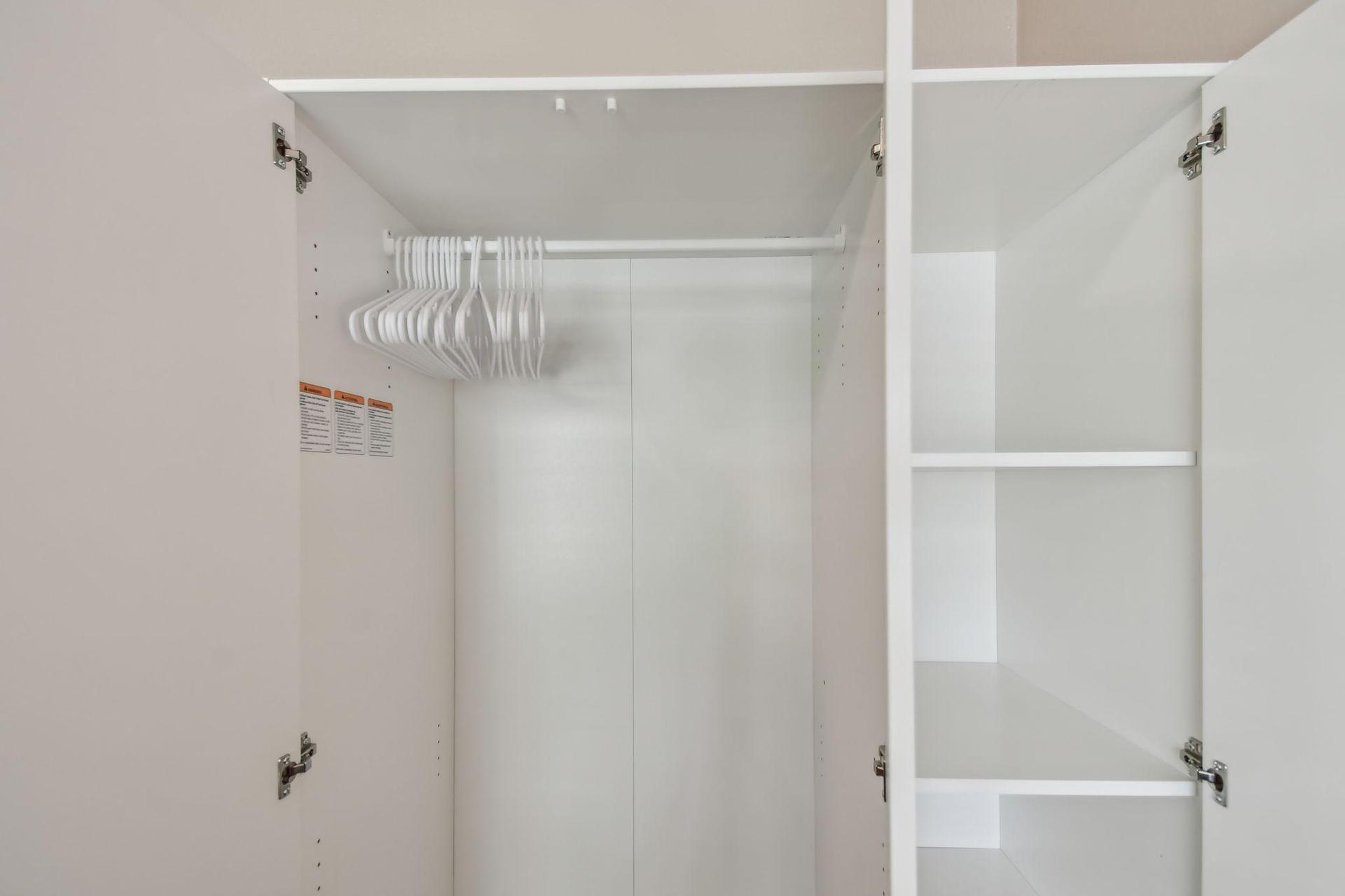 Armoire for hanging clothes and storage