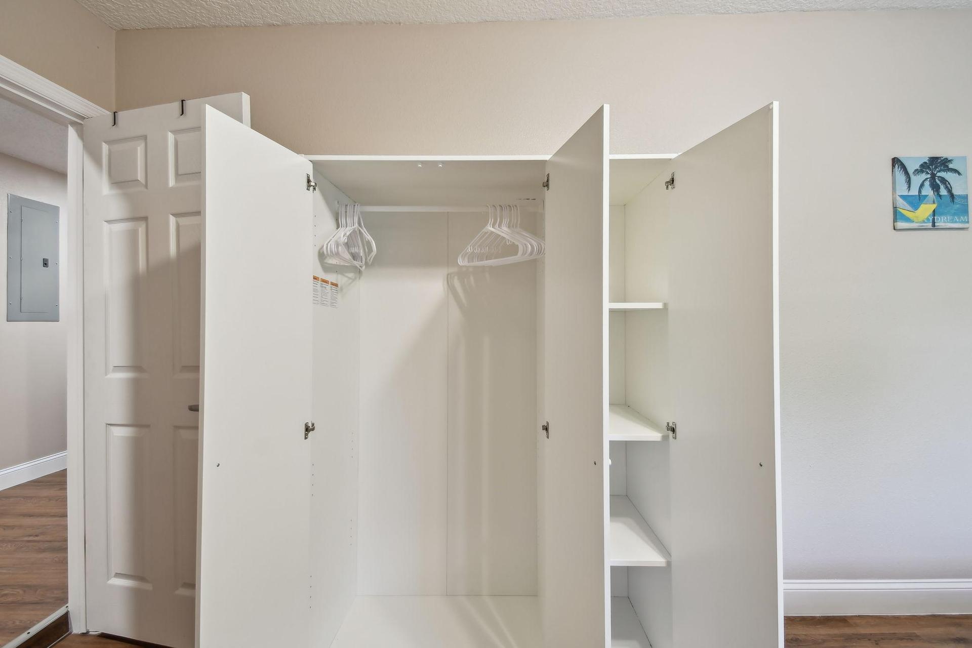 Armoire for hanging clothes and storage