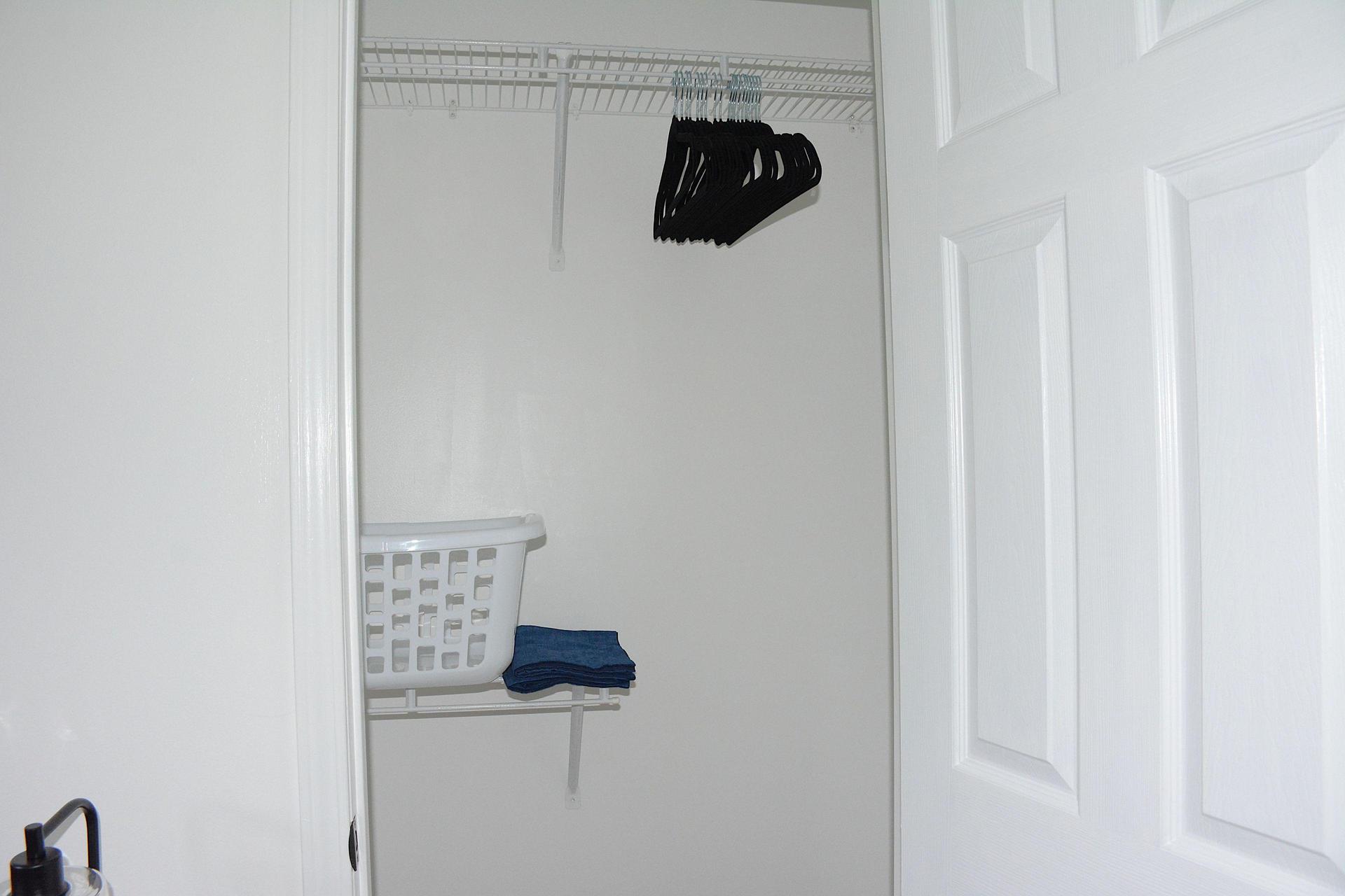 Hangers and hamper supplied for your convenience.