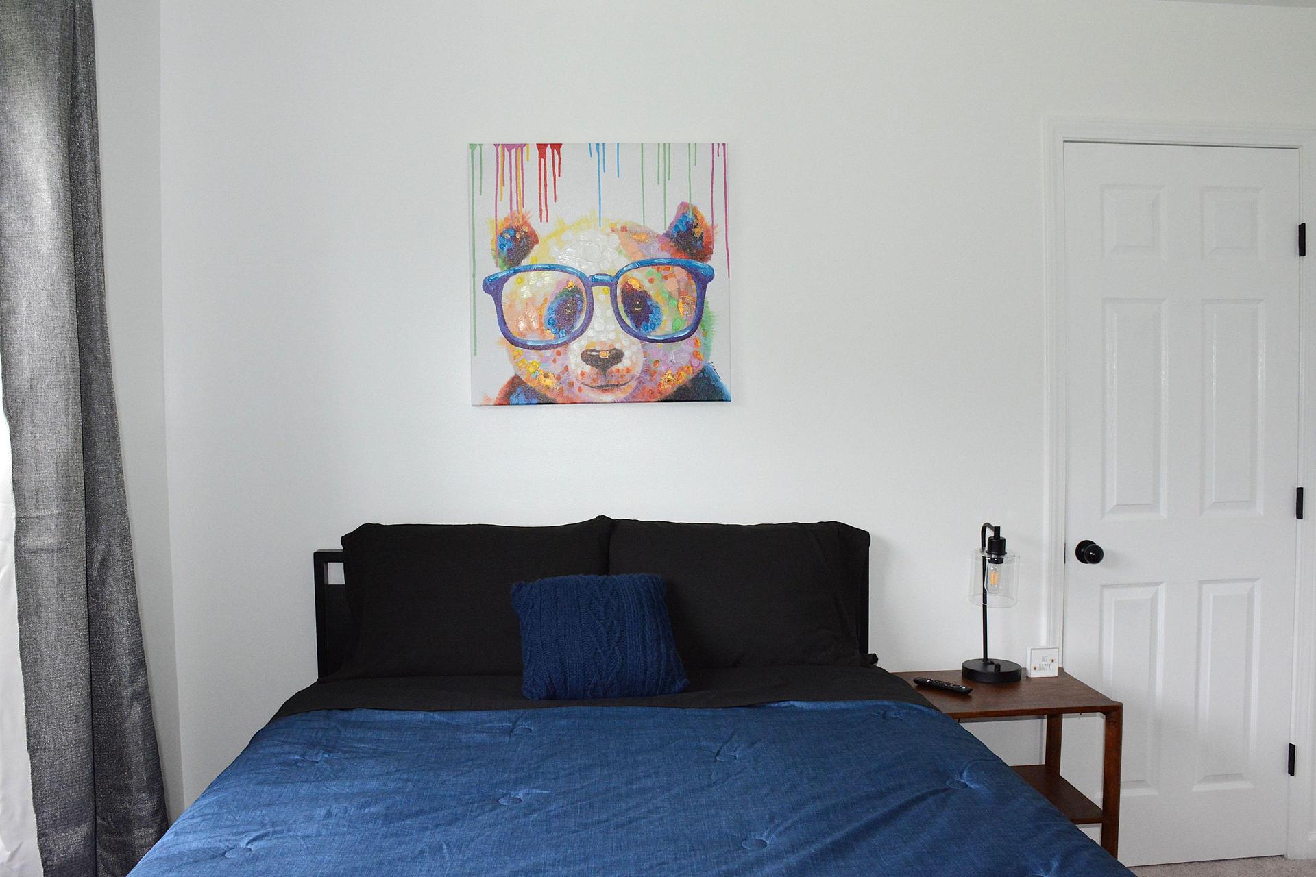 Linen provided, with side table and lamp.