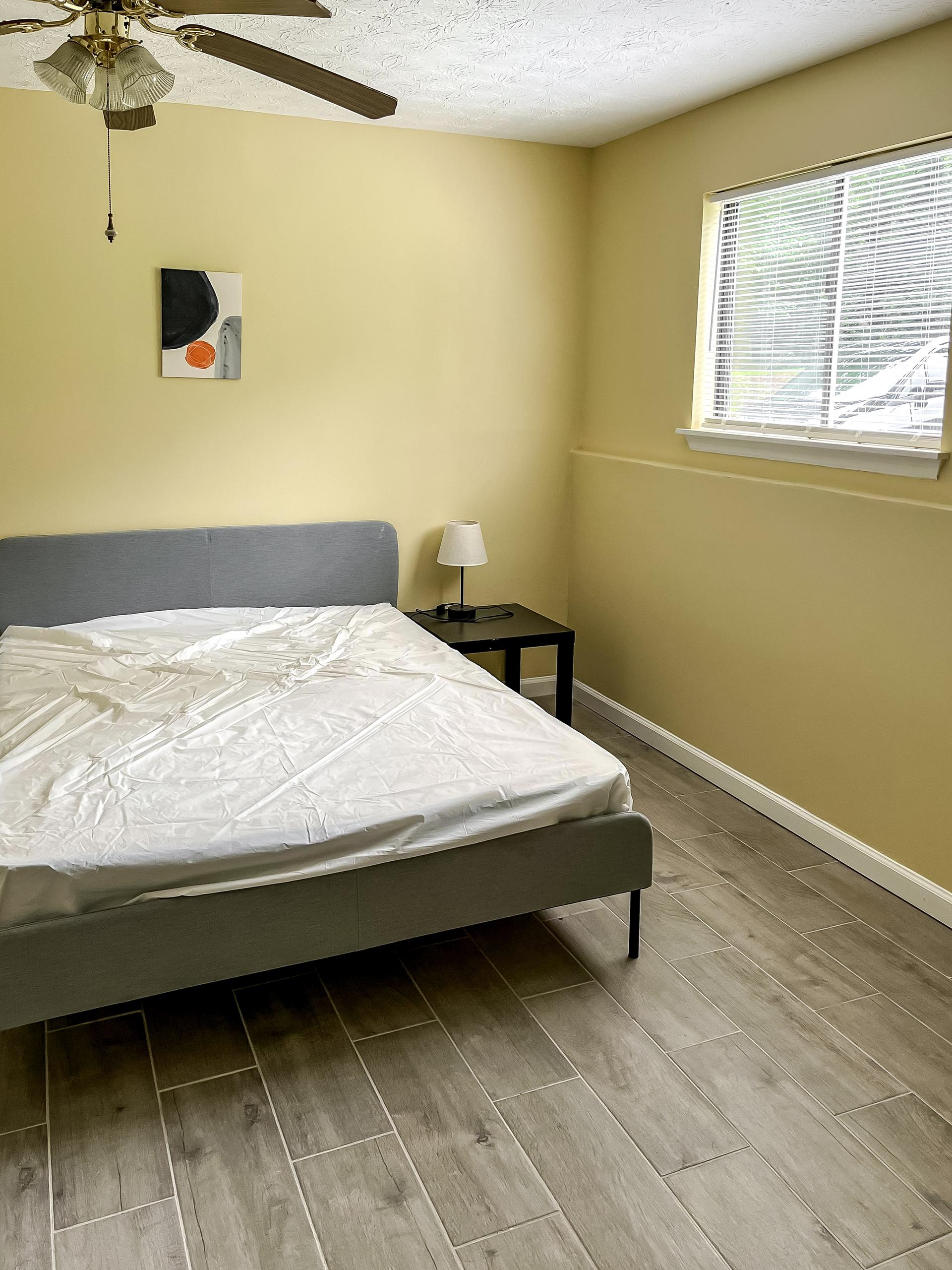 bedroom, detected: bed, window blind, ceiling fan