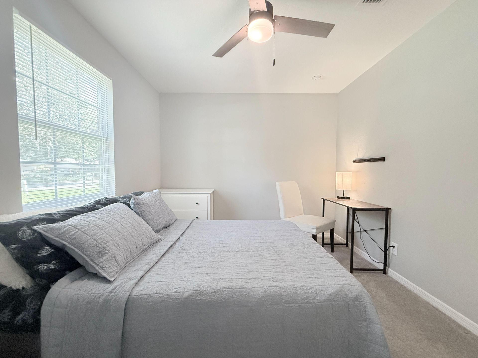 Full Size Bed Just Steps From the Shared Bathroom