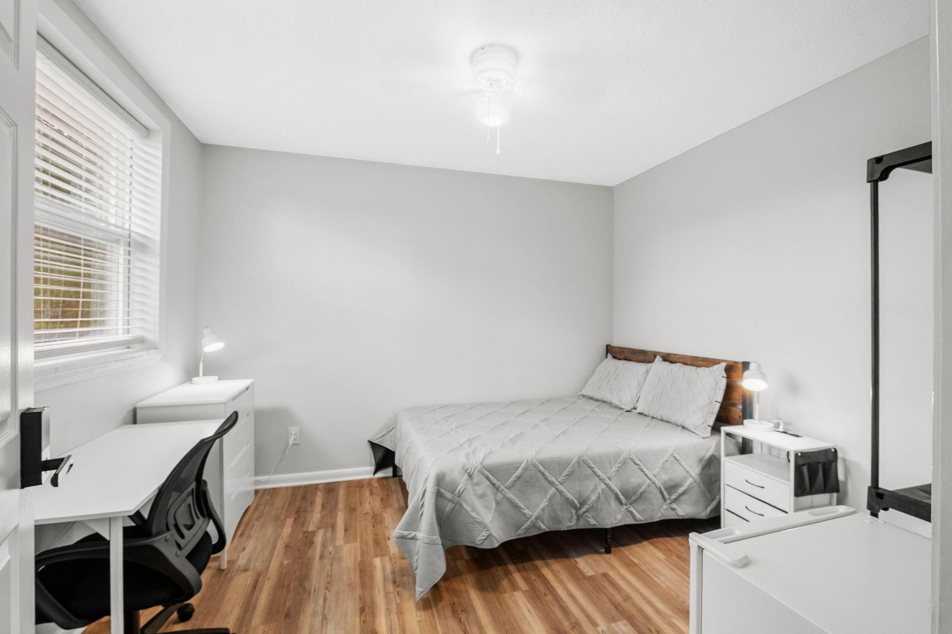 10'2"x11'7"
Full size bed, nightstand with charger