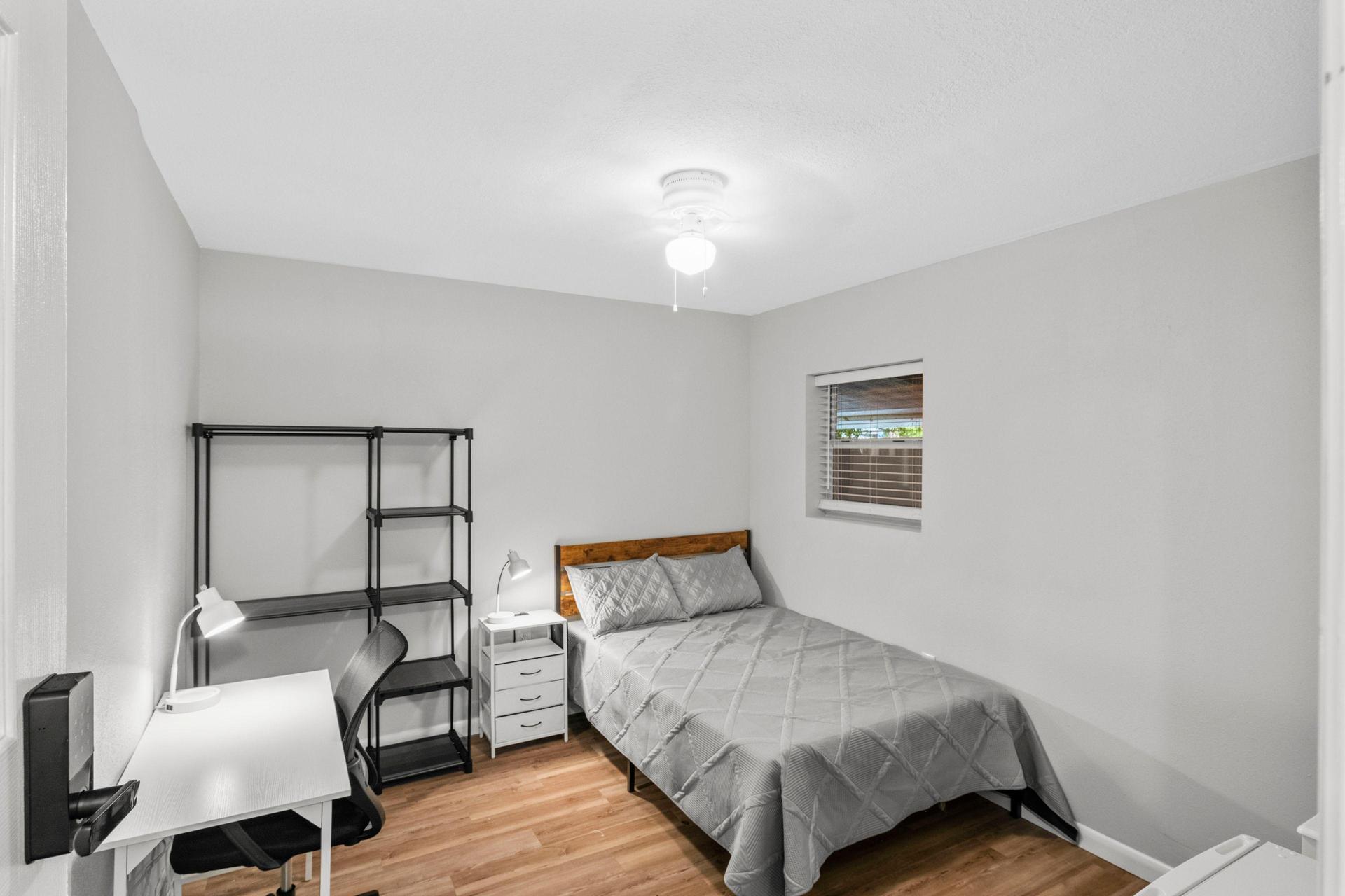 10'2"x11'7"
Full size bed, nightstand with charger, wardrobe