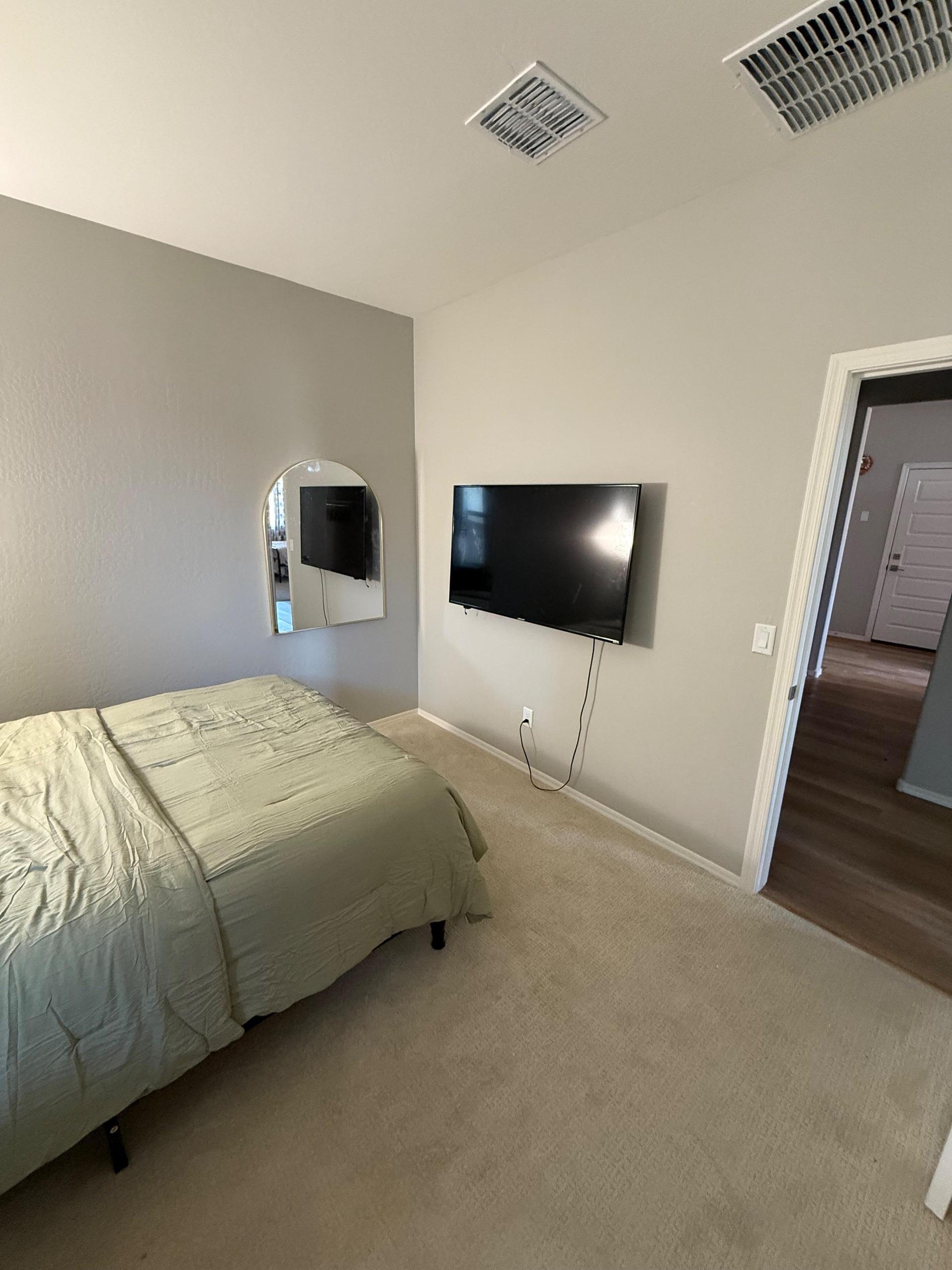 55 inch TV and mirror