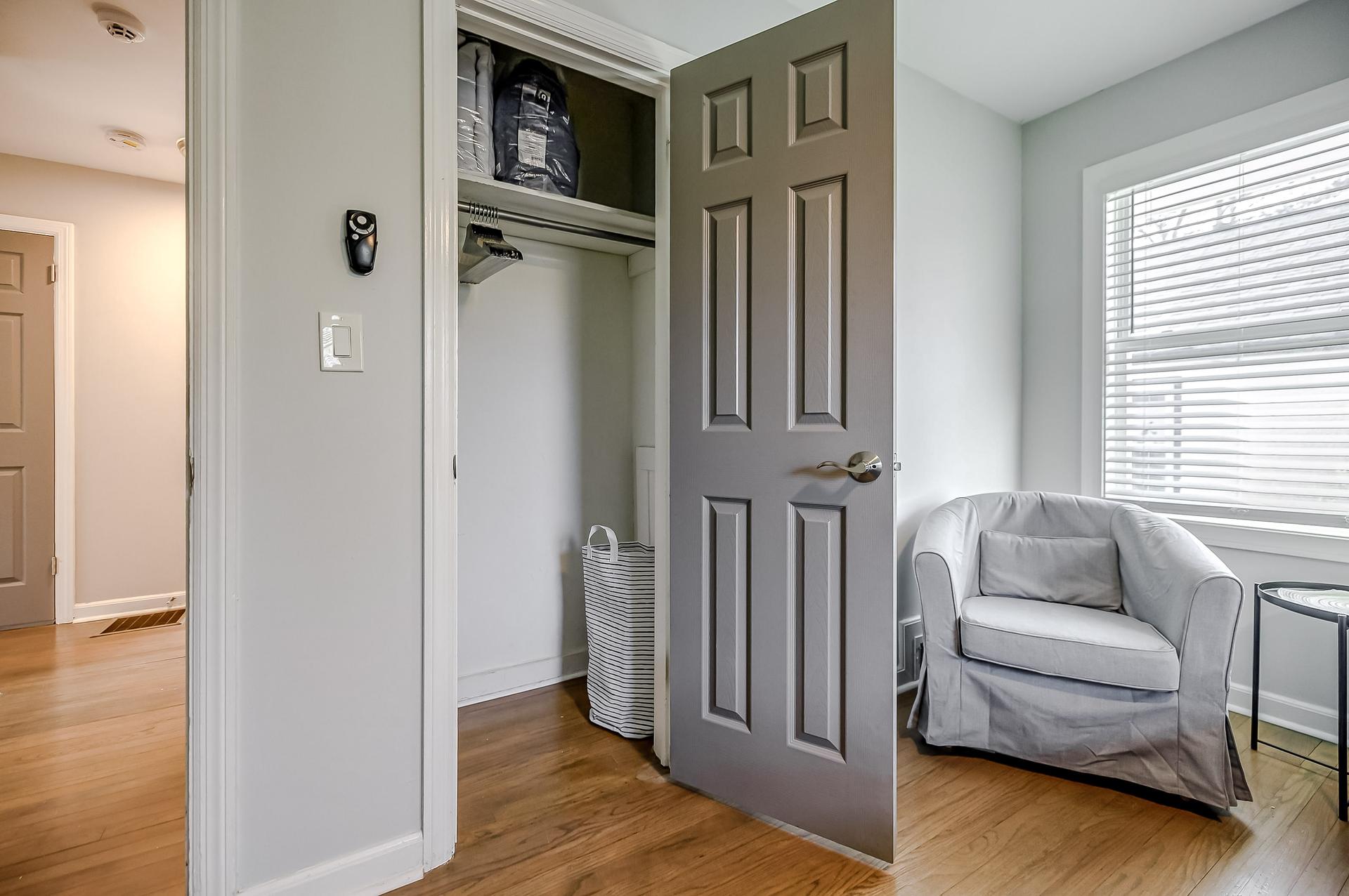 bedroom, detected:window blind, bed, refrigerator