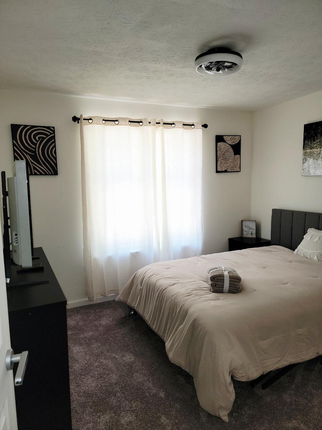 QUEEN BED WITH DESK AND CLOSET 42IN TV DRESSER NIGHTSTAND AND MIRROR, COMES WITH BEDDING AND TOWELS  ALL YOU NEED IS PILLOWS