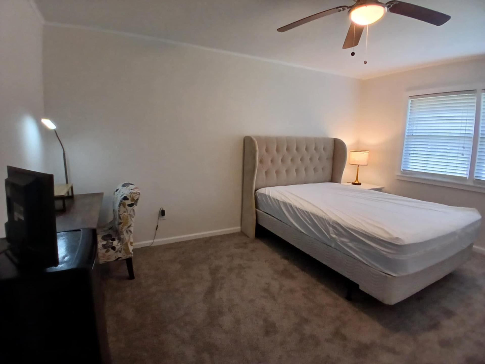 Large bedroom with extra space.