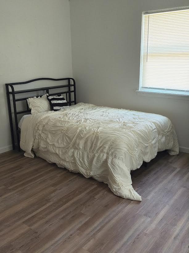 Full bed with headboard charging station. Mattress topped with mattress pad only)