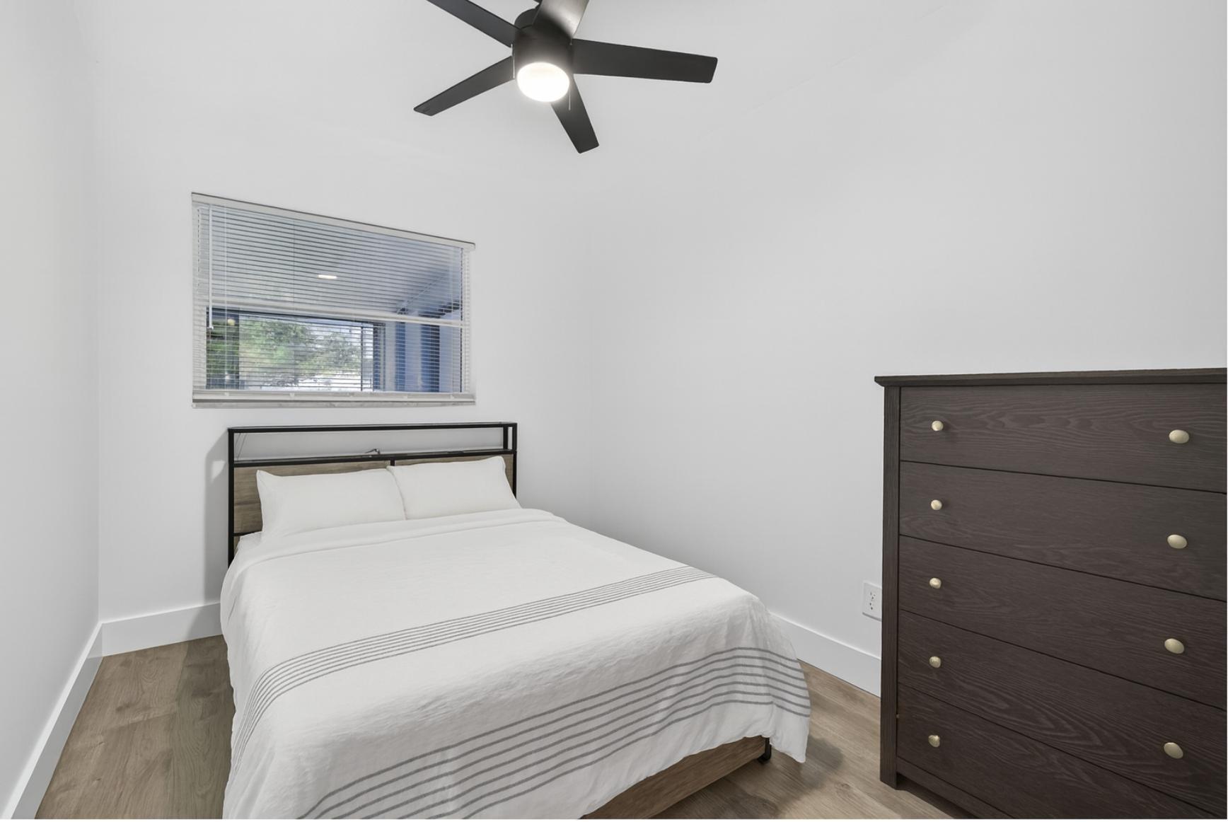 This photo has been virtually staged with bedding - please note, bedding is not provided.