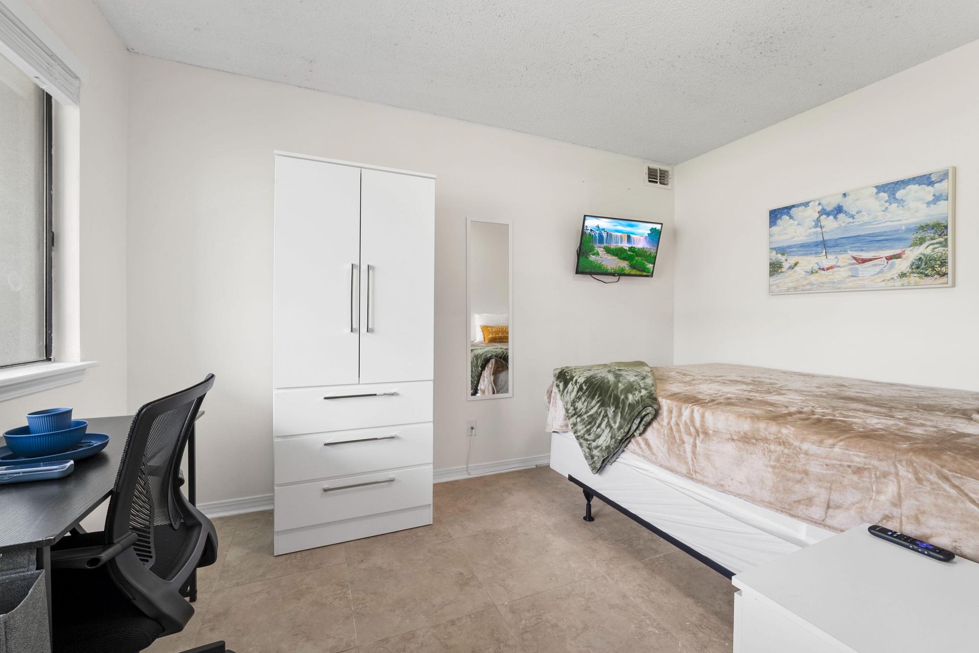 Queen bed with dresser/closet