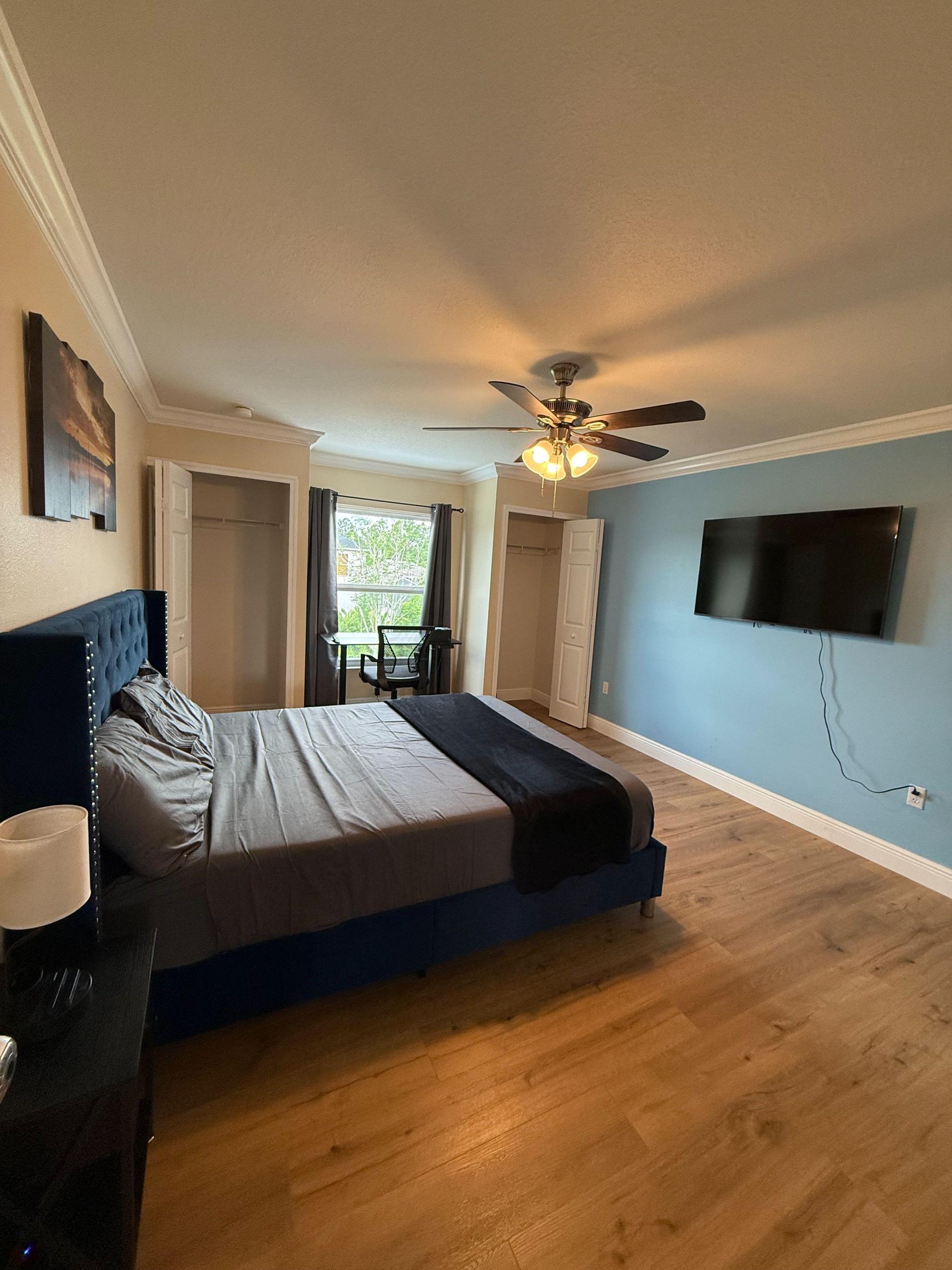 Queen bed, sheets, pillows and blanket, 55" smart TV