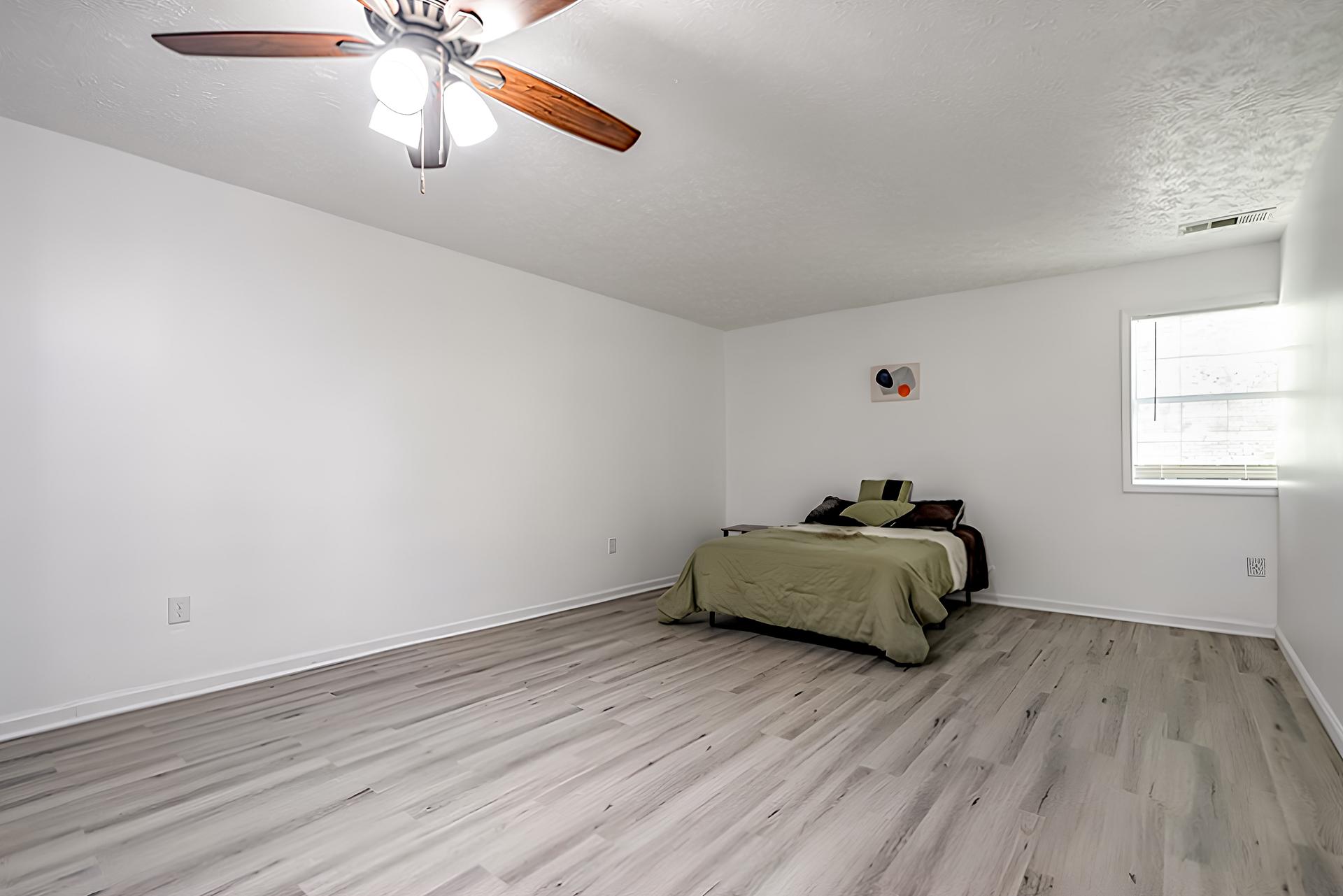 bedroom, detected: ceiling fan, window blind, bed