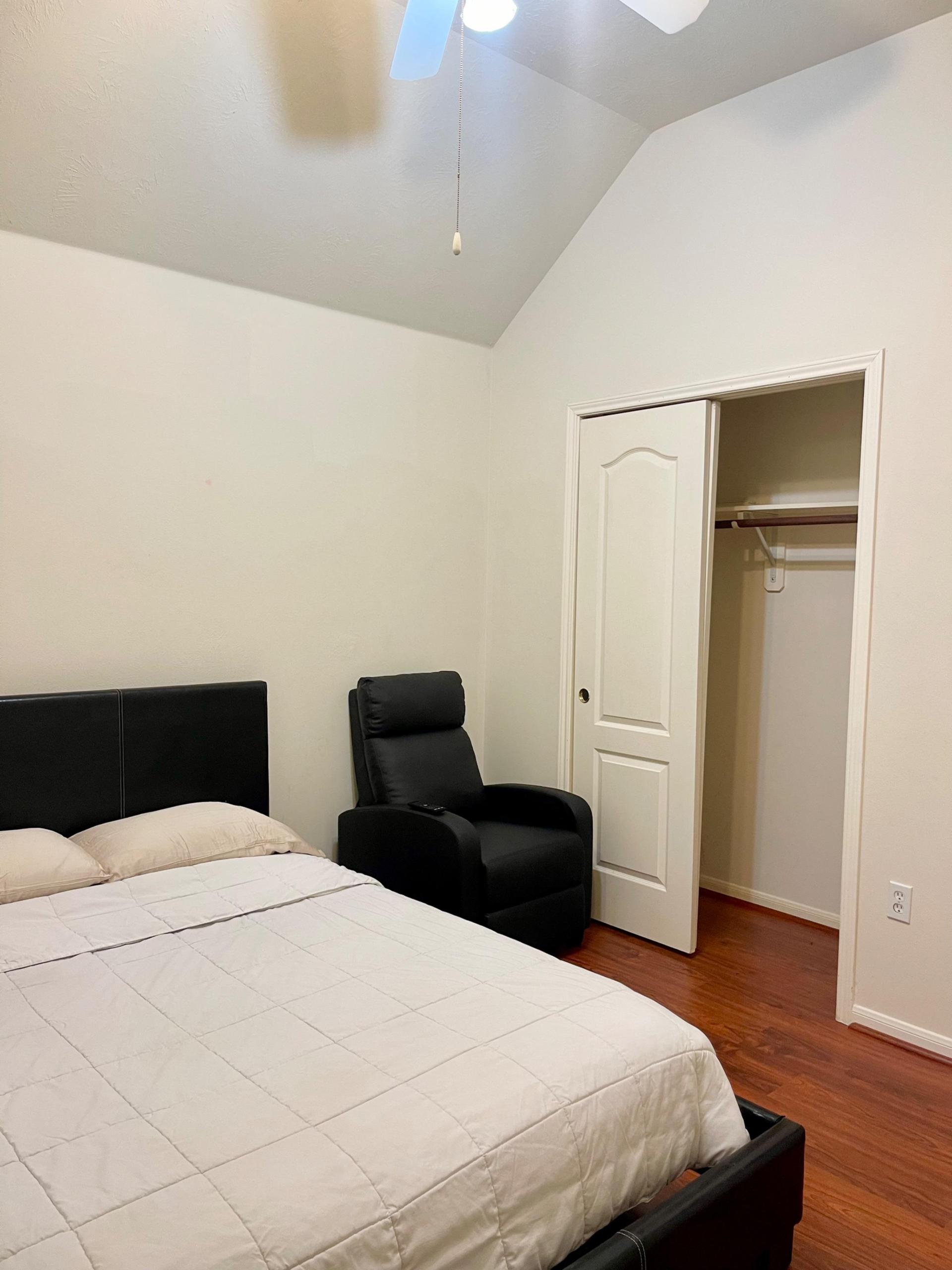 Full-size bed and recliner nice closet space
