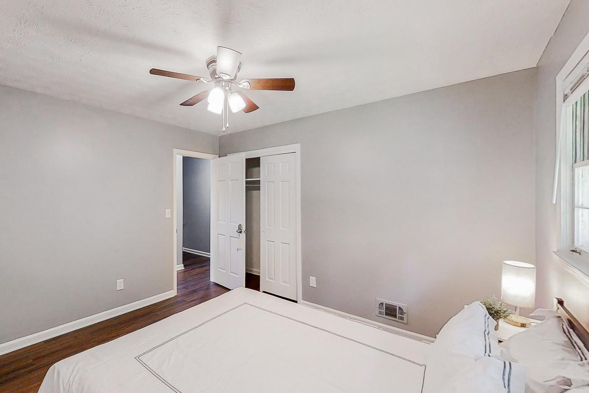 bedroom, detected: ceiling fan, bed, window blind