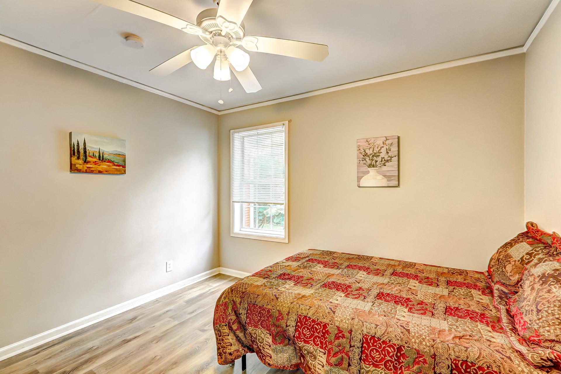 bedroom, detected: ceiling fan, window blind, bed