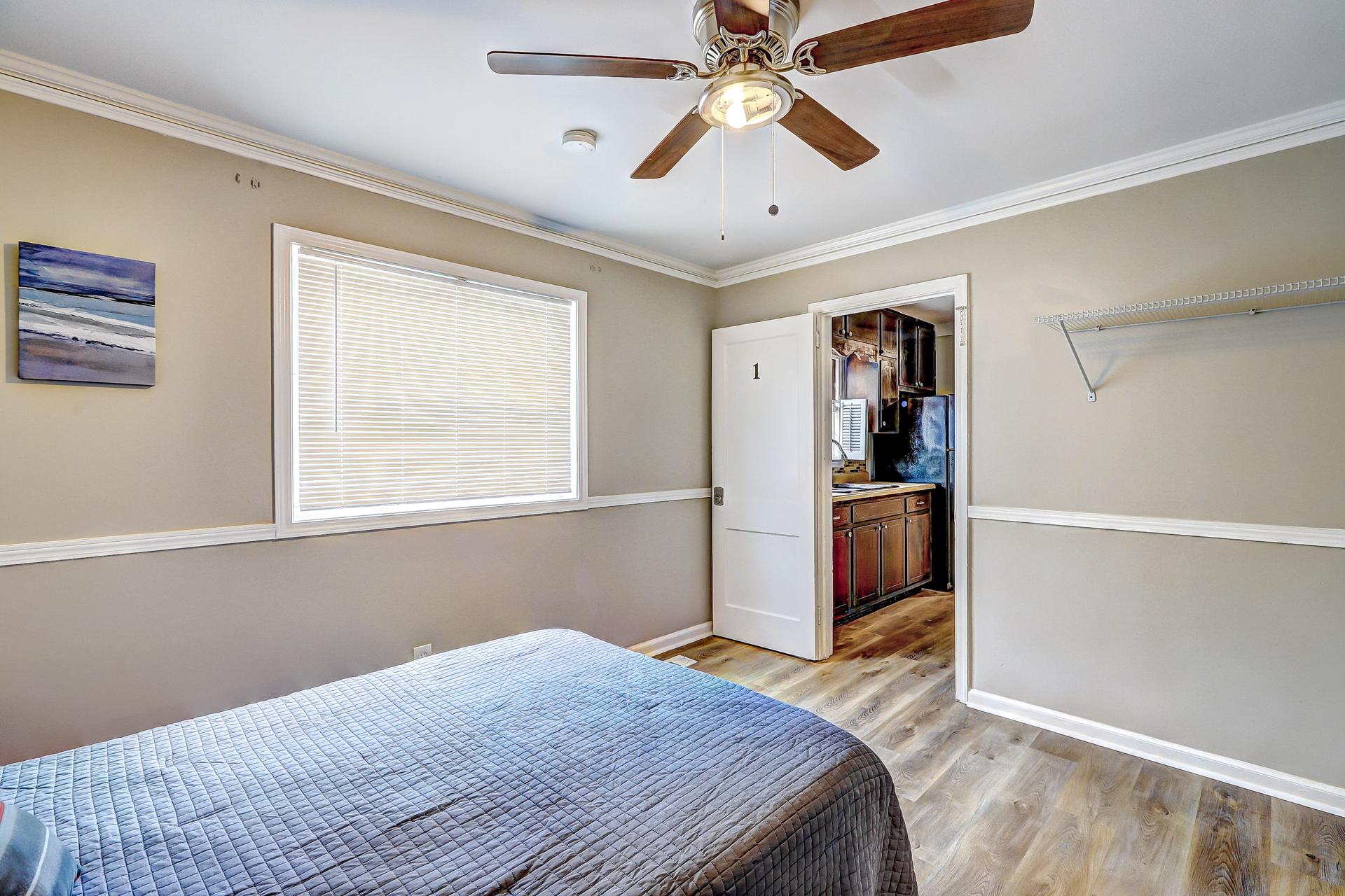 bedroom, detected: ceiling fan, window blind, bed