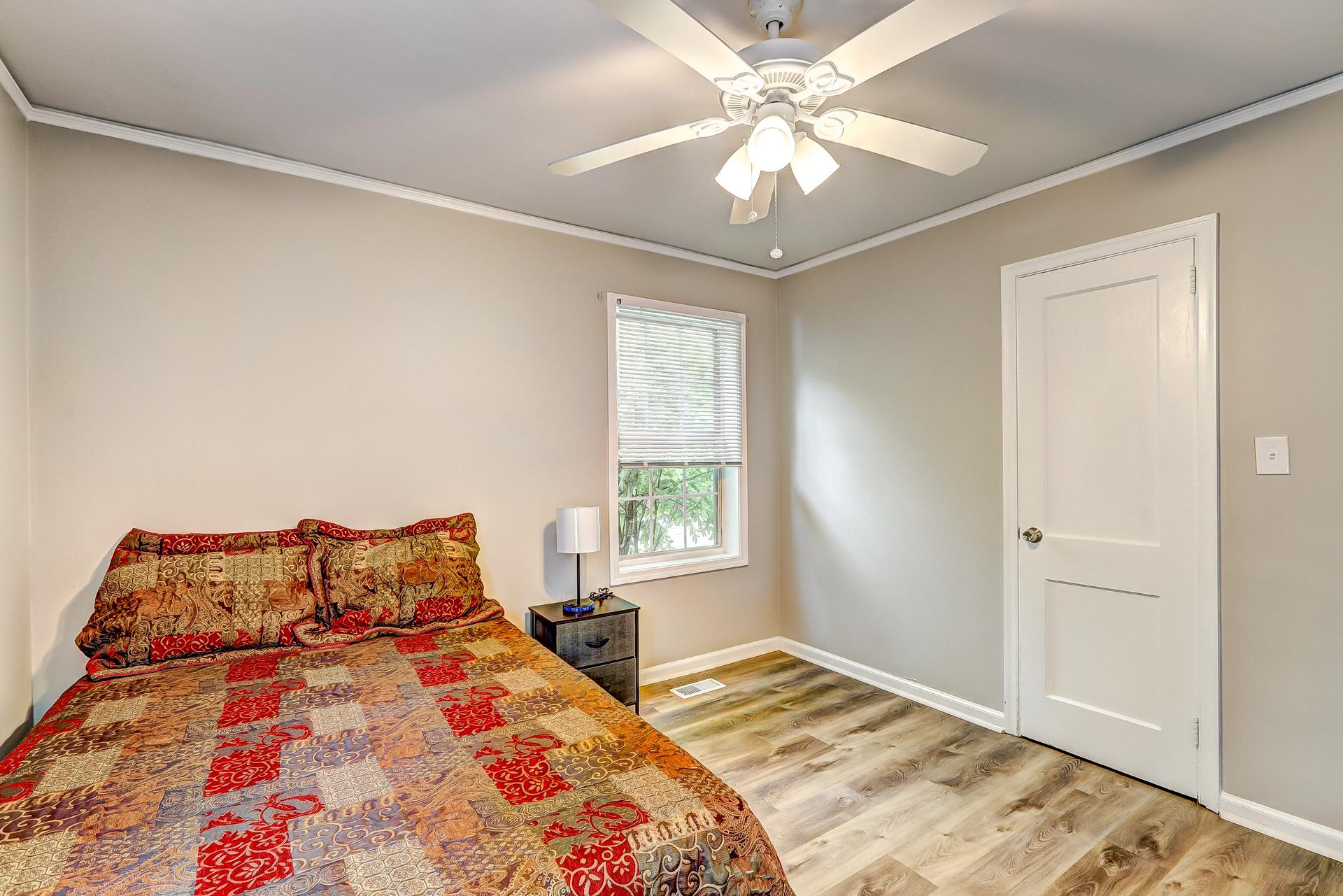 bedroom, detected: ceiling fan, window blind, bed