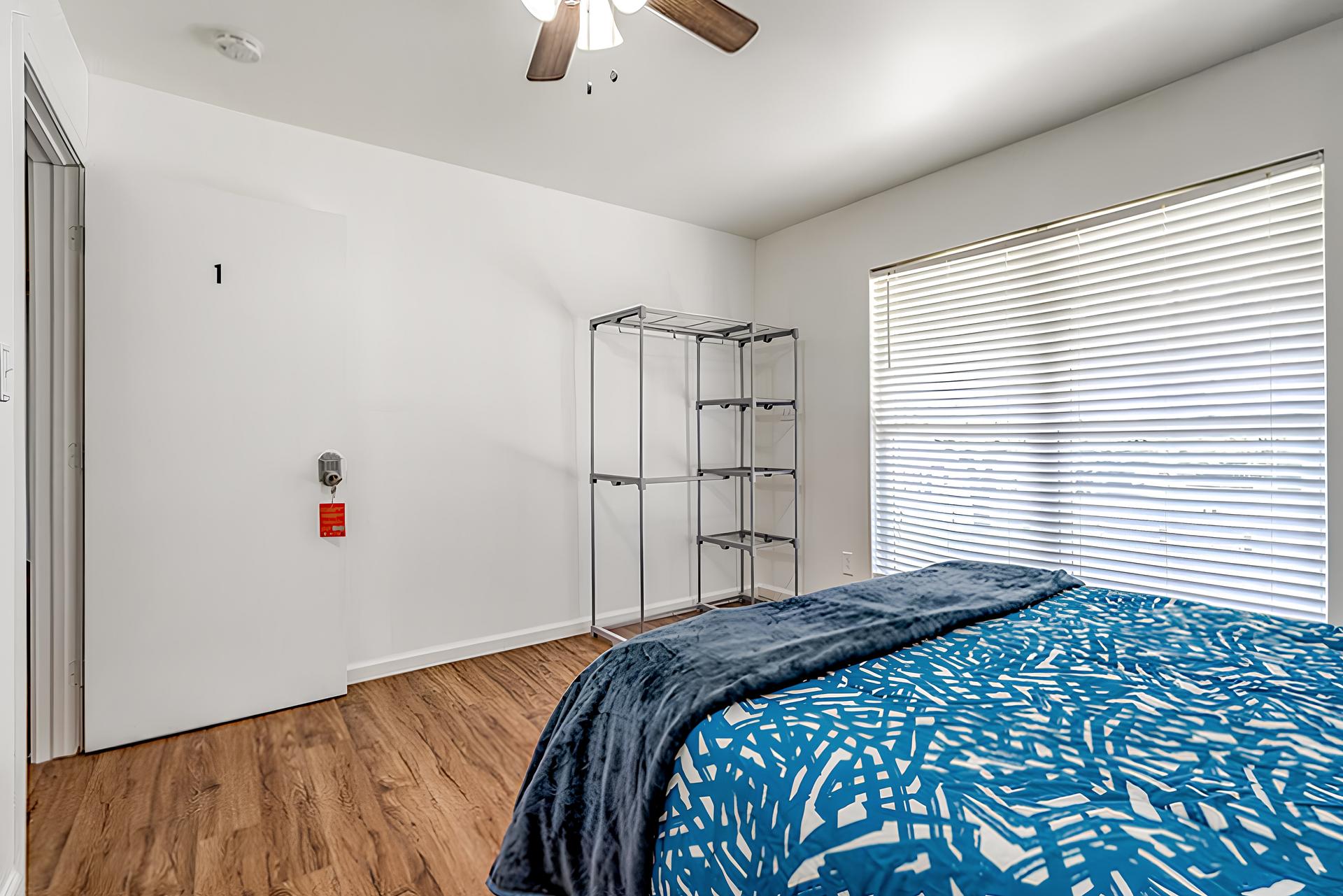 bedroom, detected: ceiling fan, window blind, bed