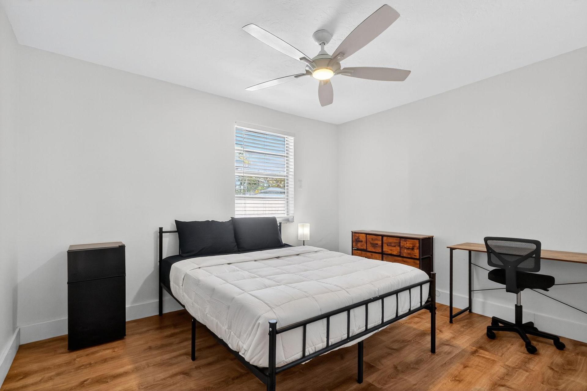 Queen size Bed with workspace and min fridge/freezer