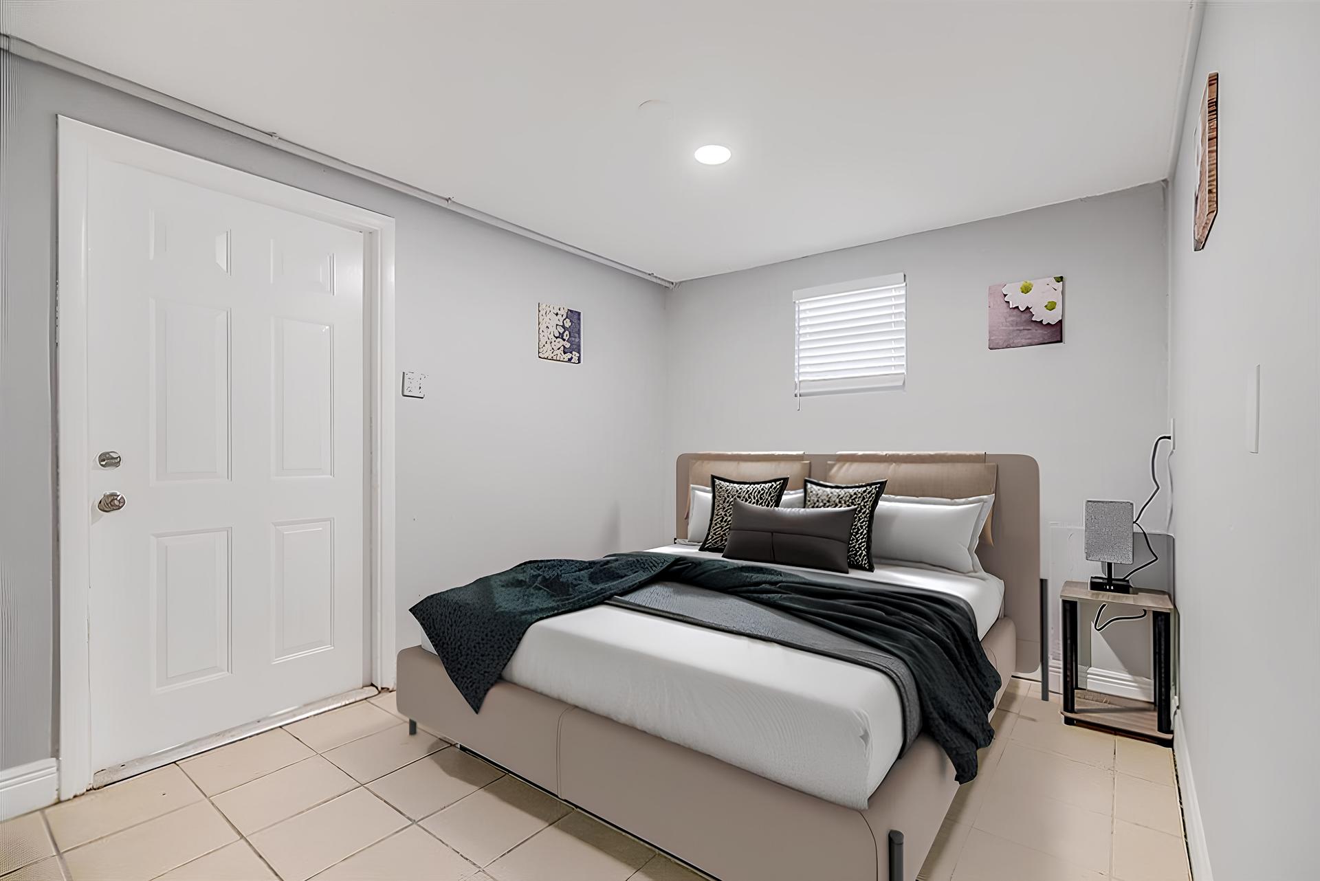 Disclaimer: Photo has been virtually staged - please view virtual tour. Exterior door in bedroom is for emergency use only.