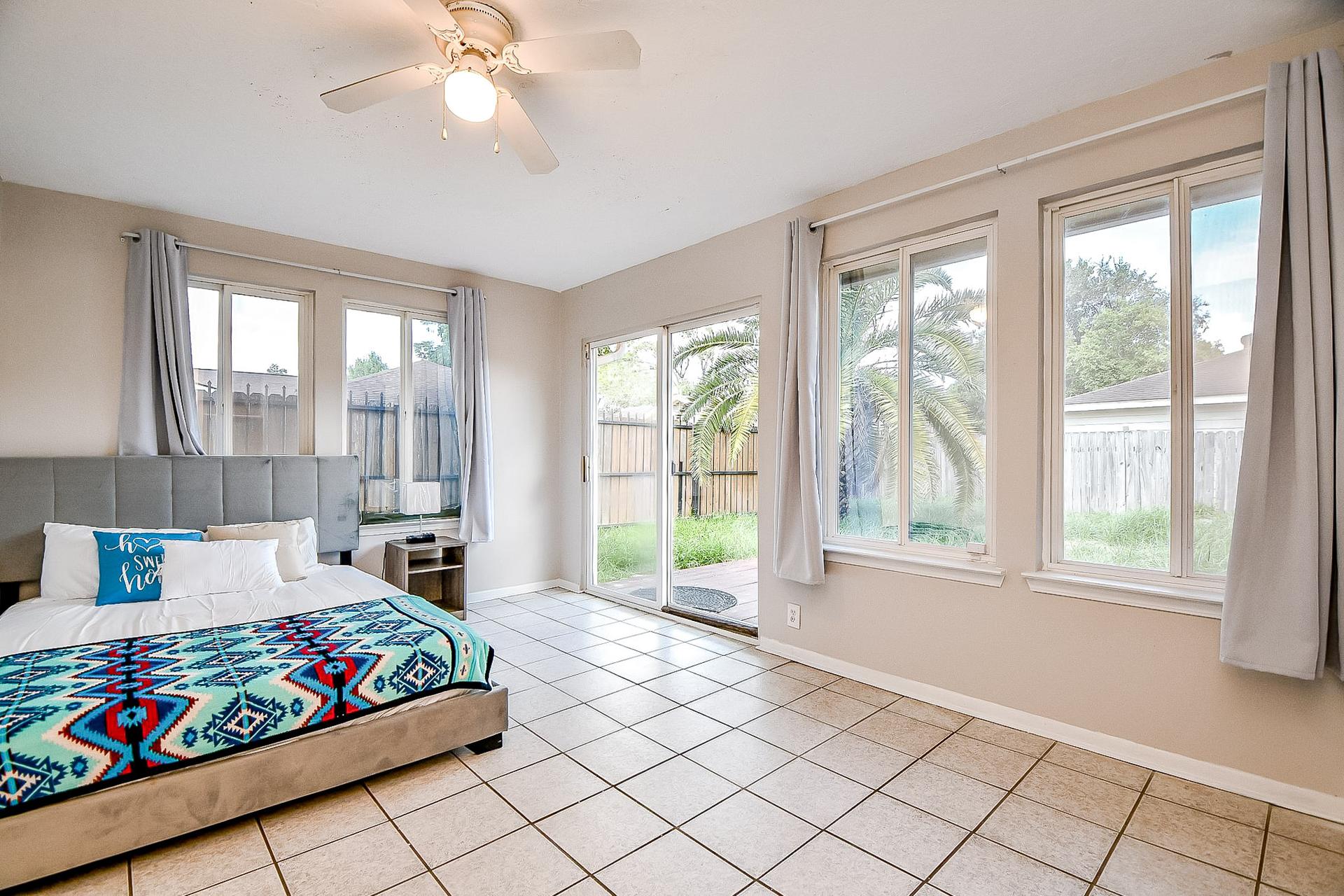 bedroom, detected: ceiling fan, bed, window blind