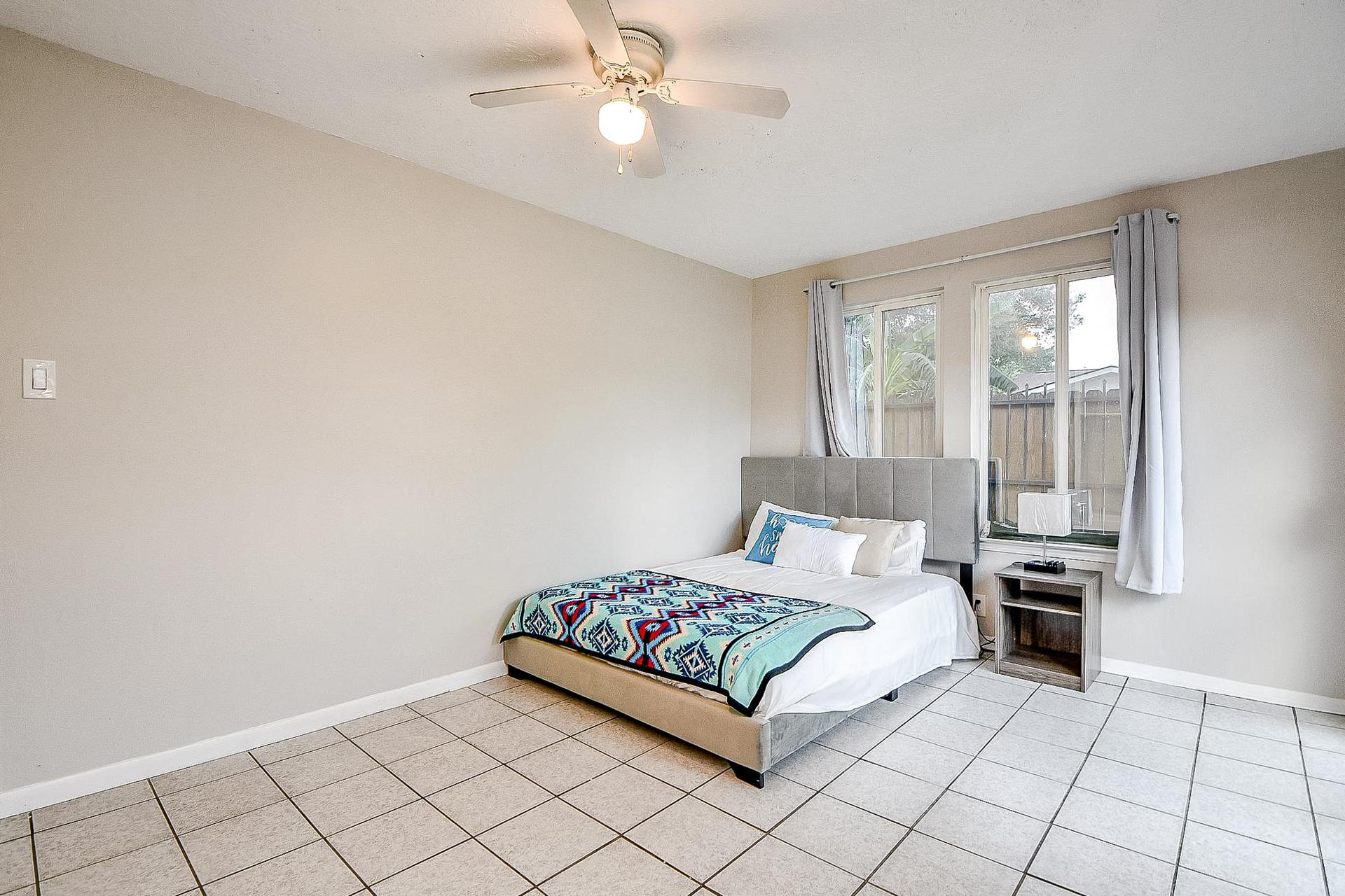 bedroom, detected: ceiling fan, bed, window blind