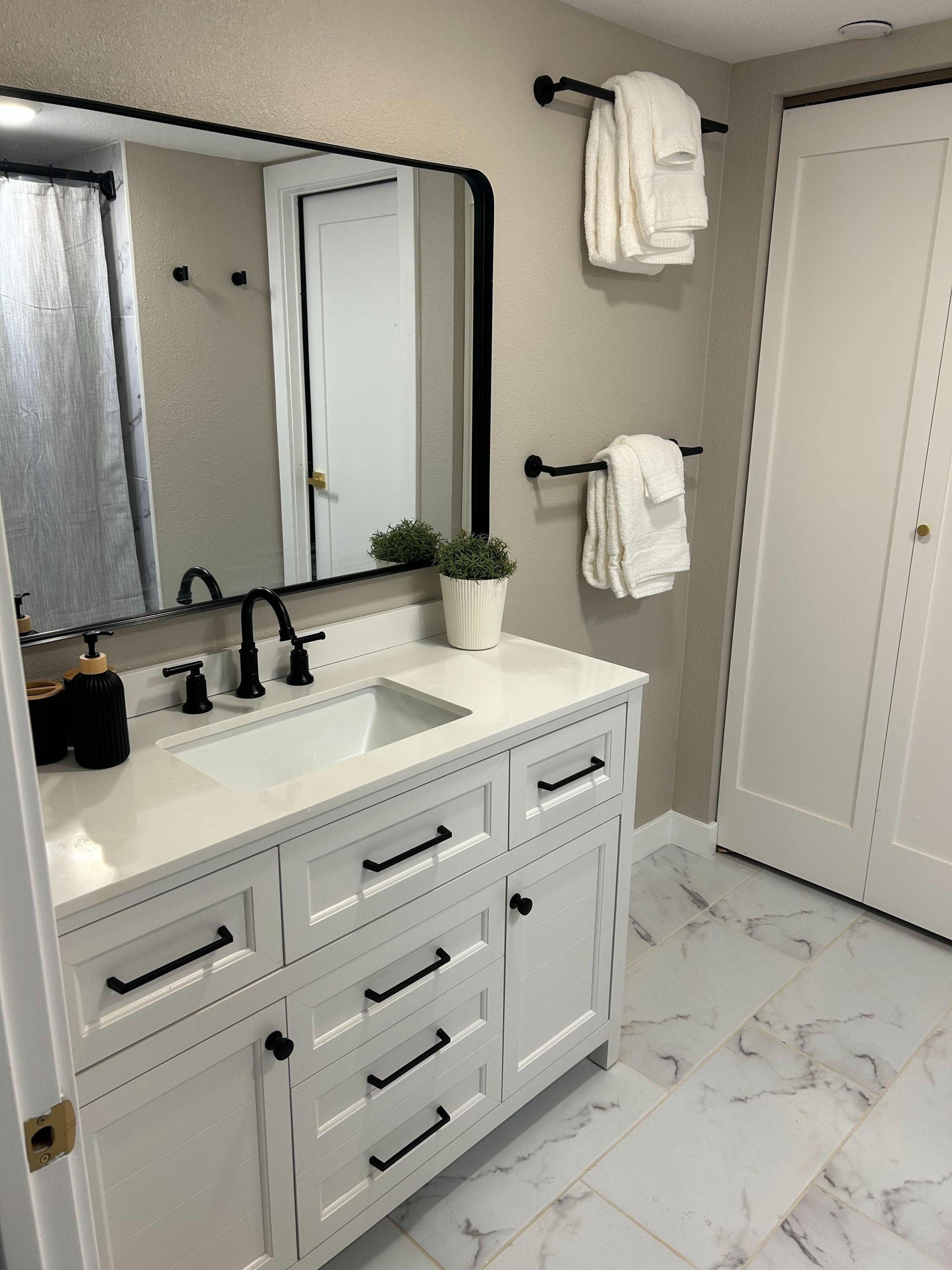 Right across from shared bathroom (Max 2) with another open bathroom 1/2 level above