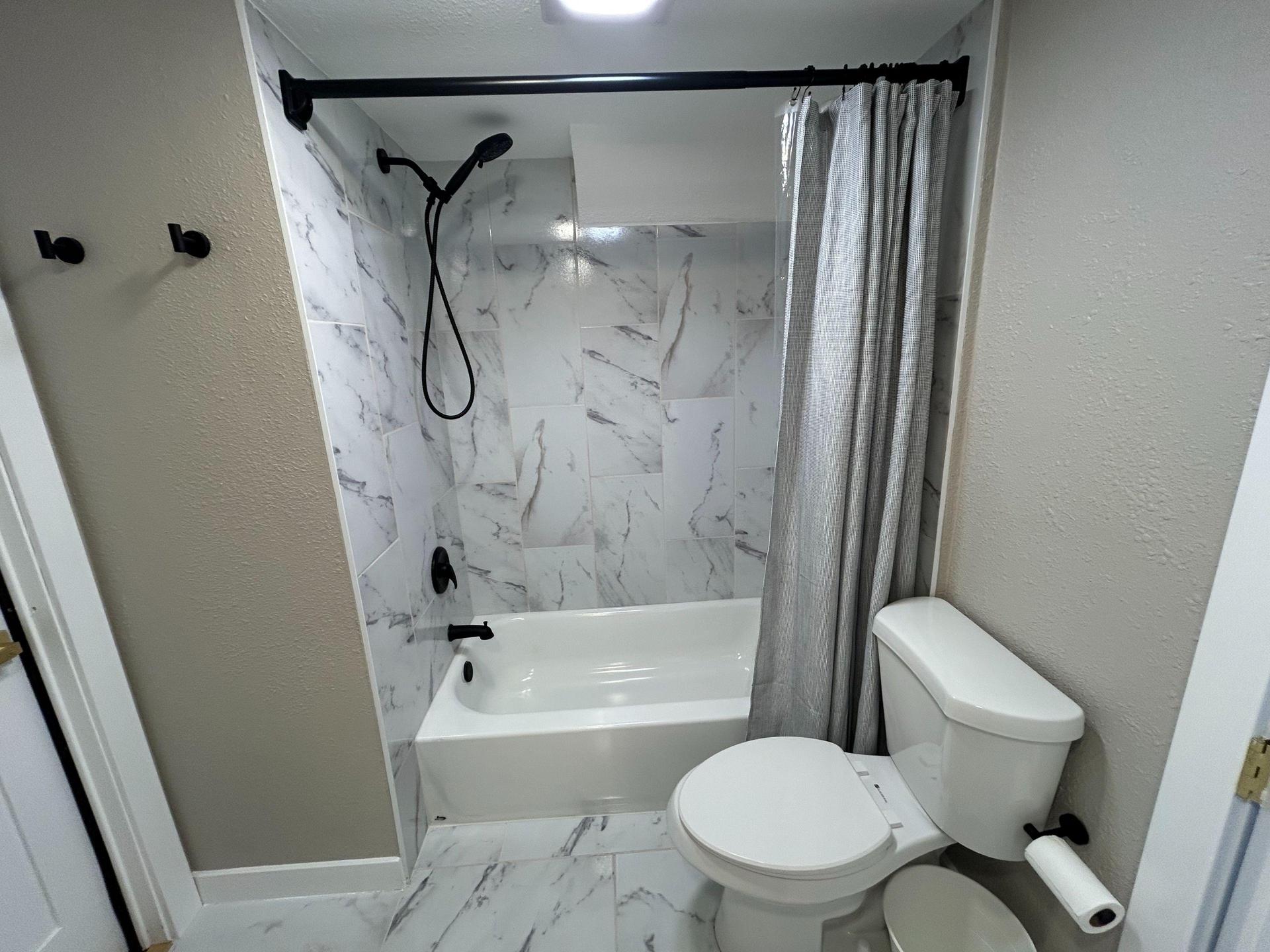 Right next to shared bathroom (Max 2) with another open bathroom 1/2 level above