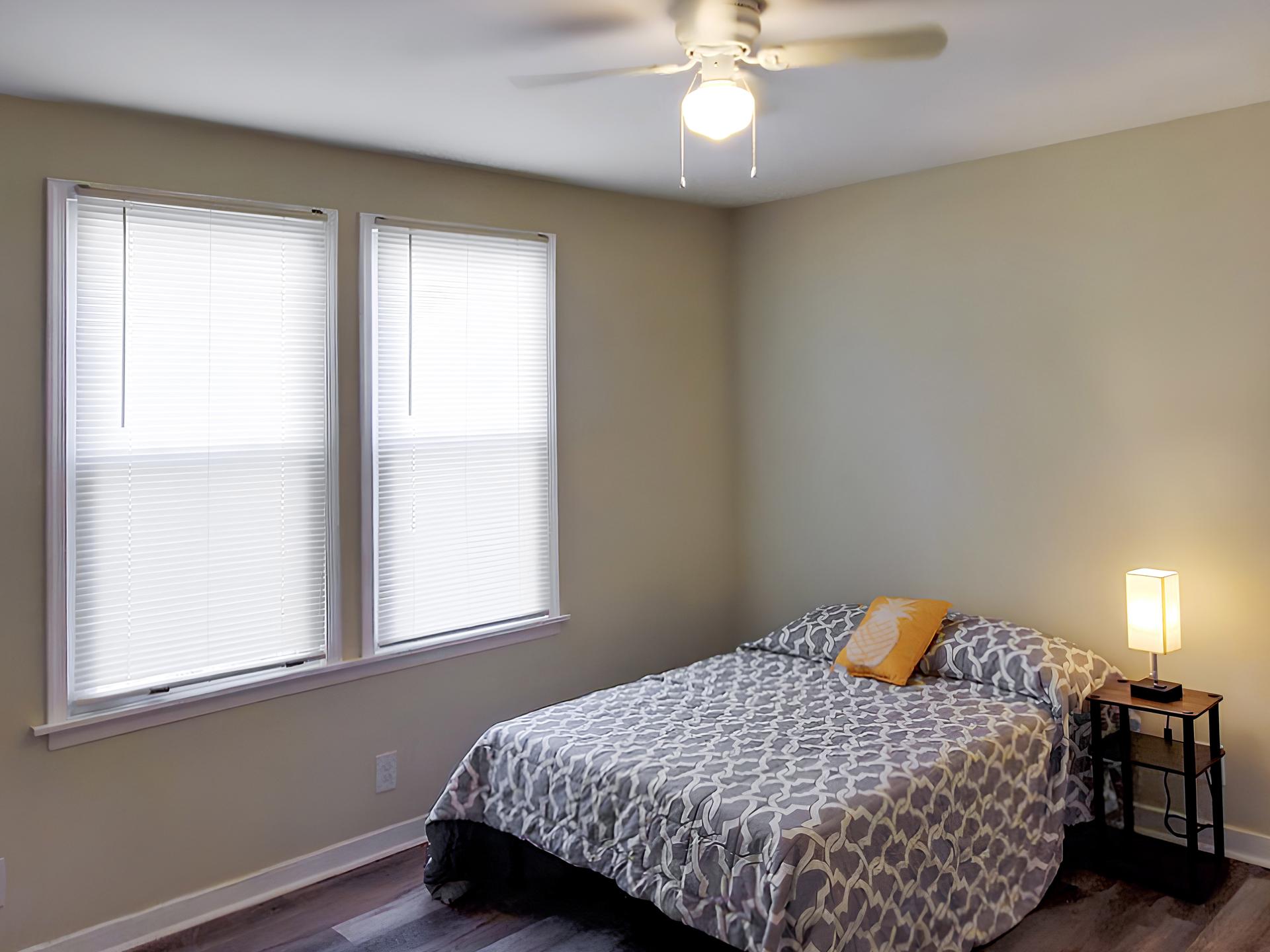 bedroom, detected: ceiling fan, window blind, bed