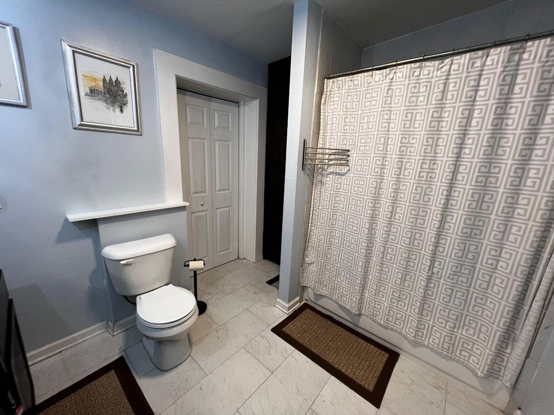 Full Bathroom with Walk-in Closet