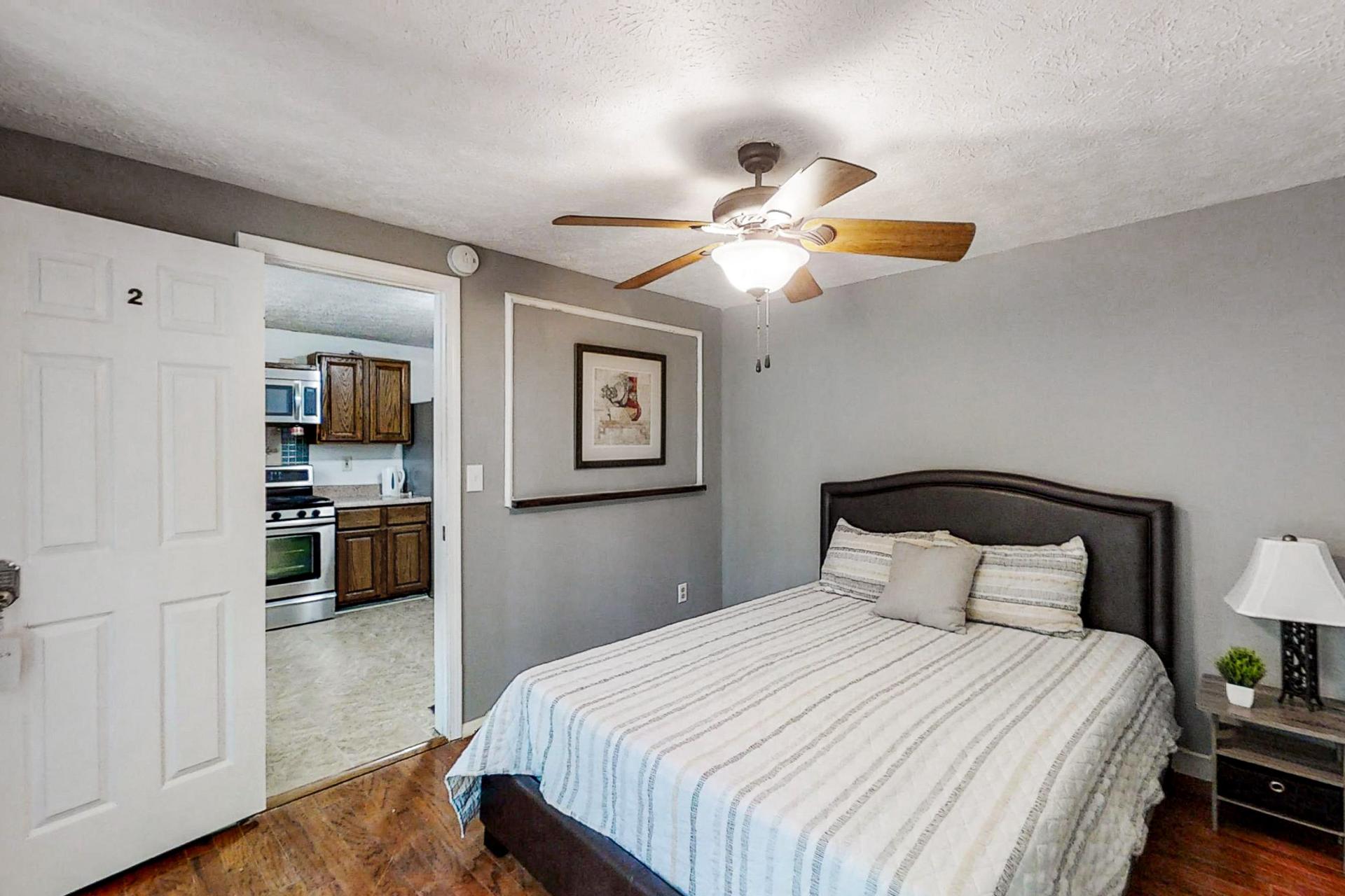 bedroom, detected: ceiling fan, bed, window blind