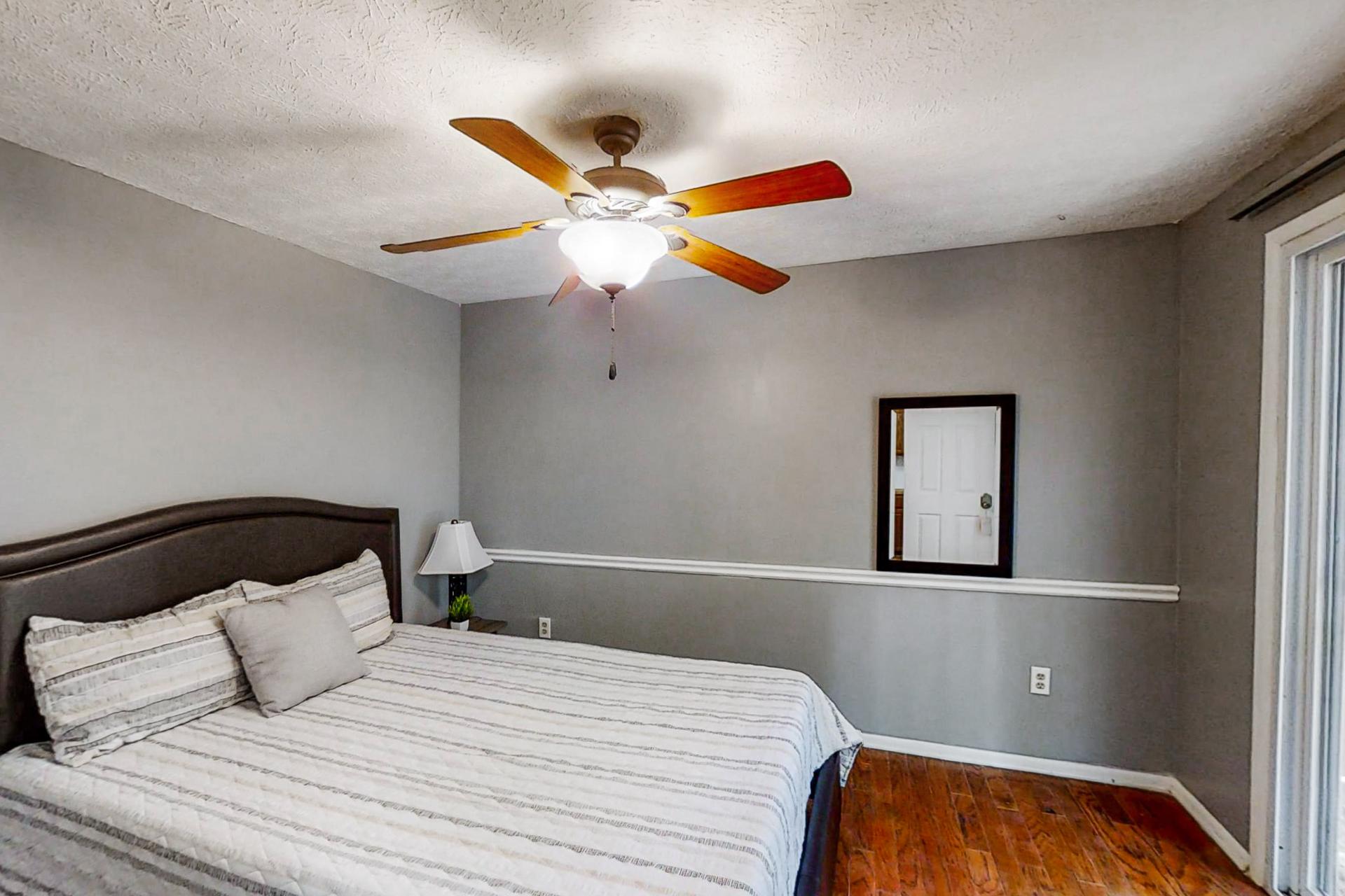 bedroom, detected: ceiling fan, window blind, bed
