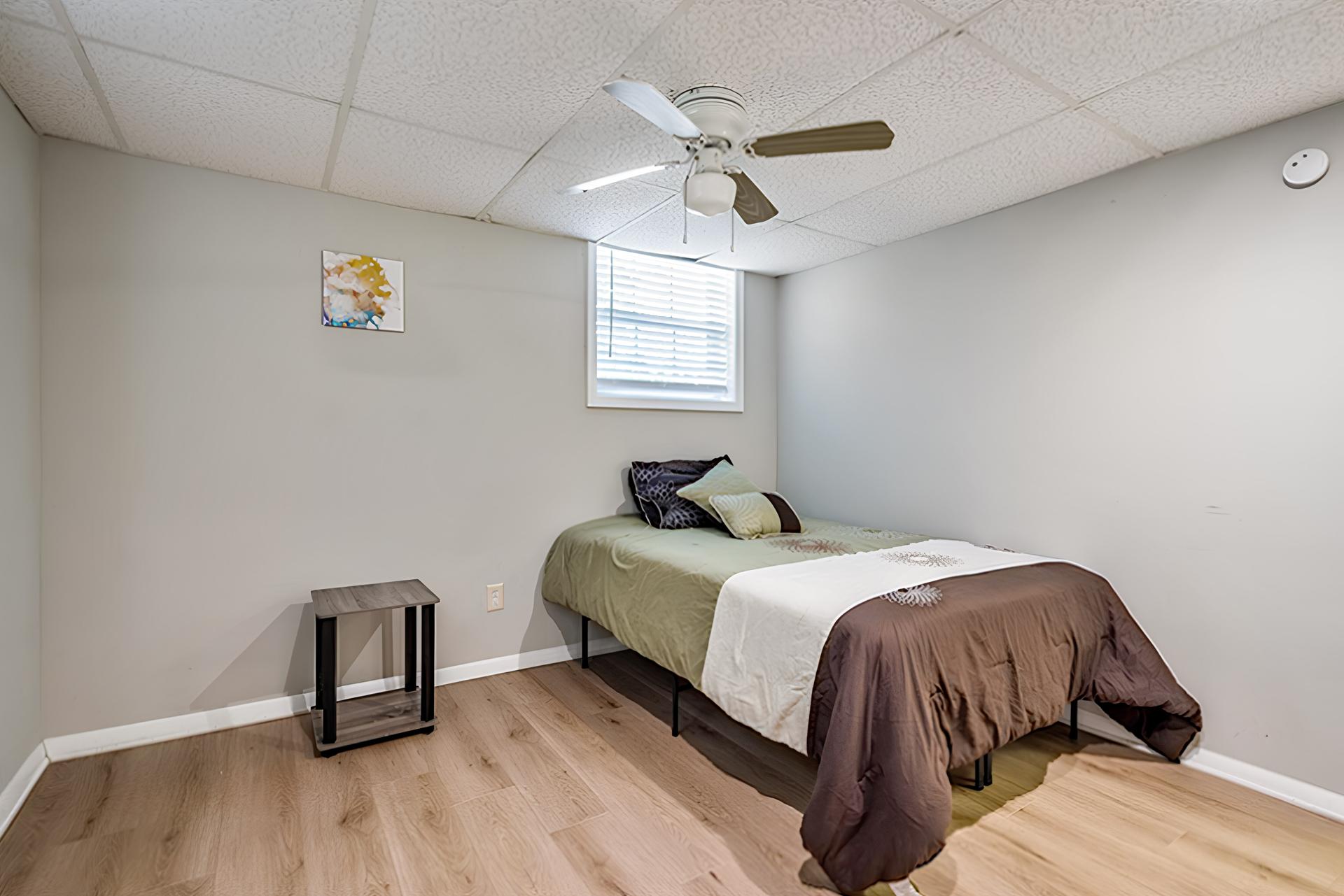 bedroom, detected: ceiling fan, bed, window blind