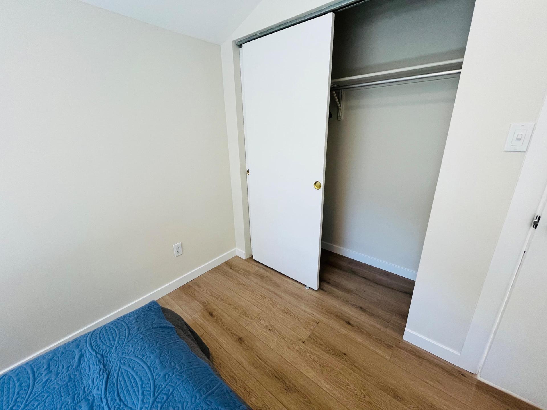 Full closet with shelving and hangers provided
