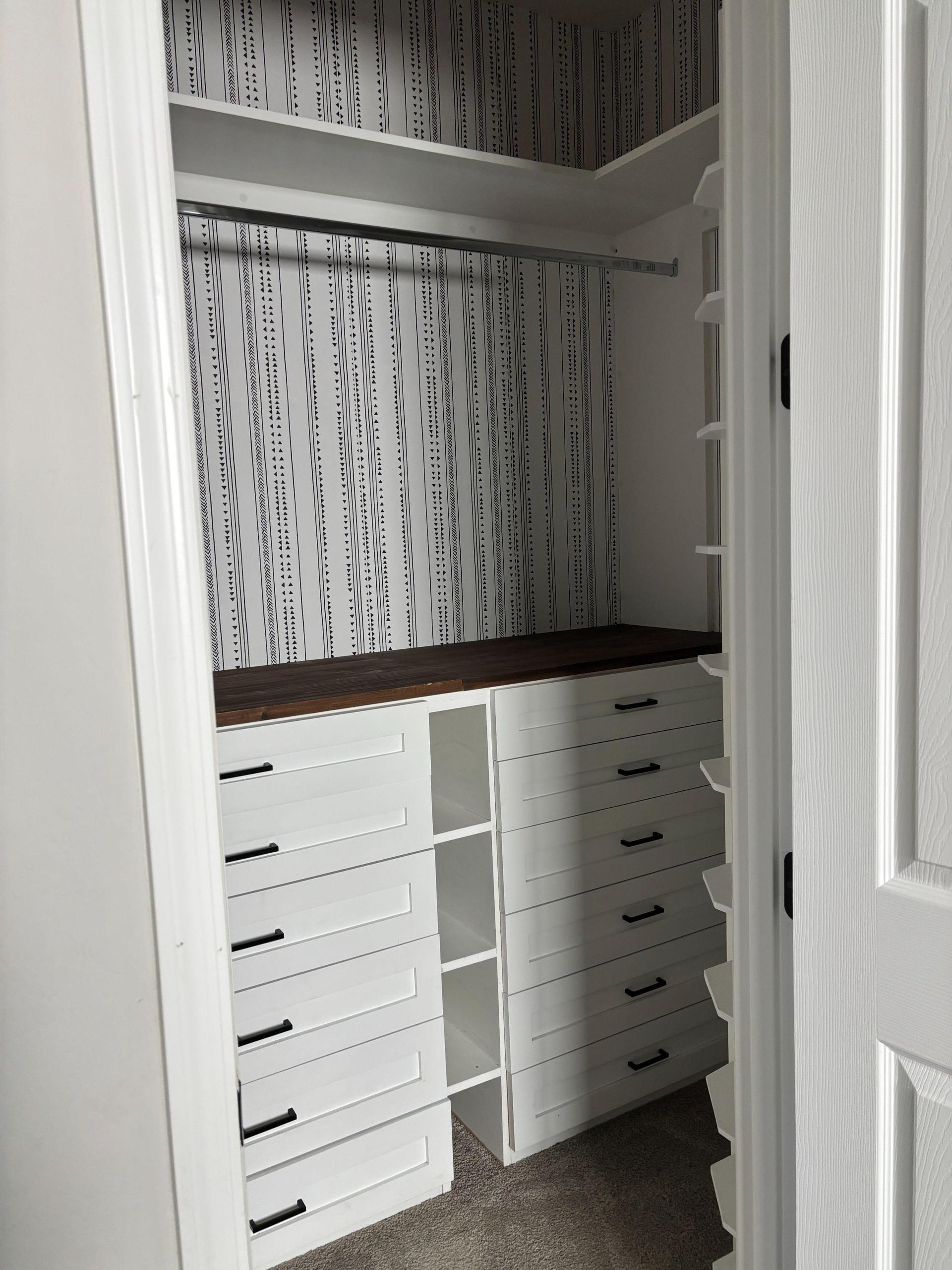 Ample closet storage with drawer space