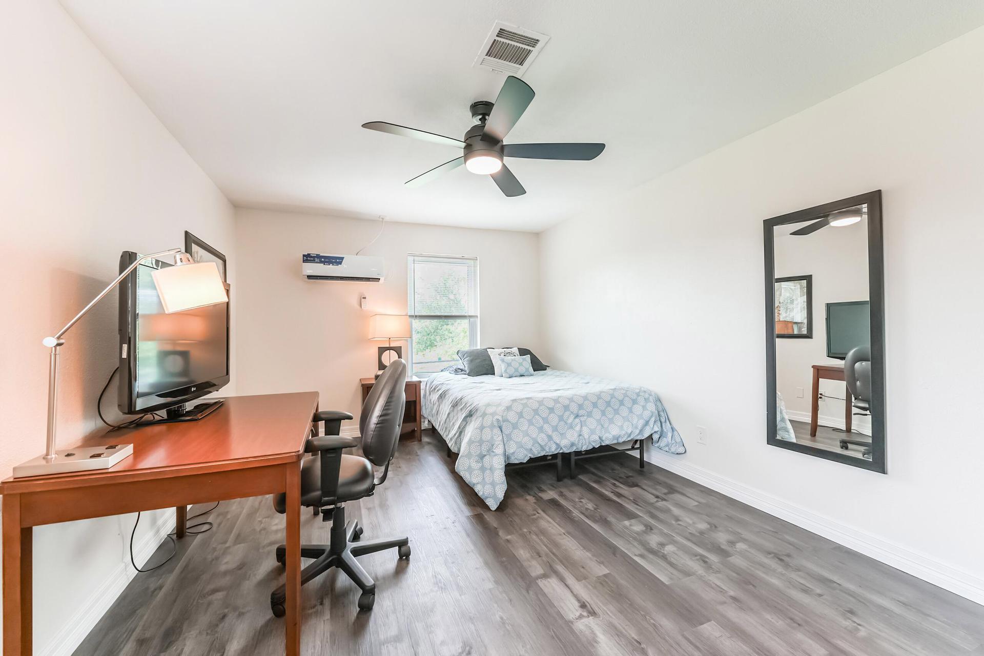 Ceiling fan with remote. Room includes a non-smart TV (need your favorite USB device for streaming to attach)