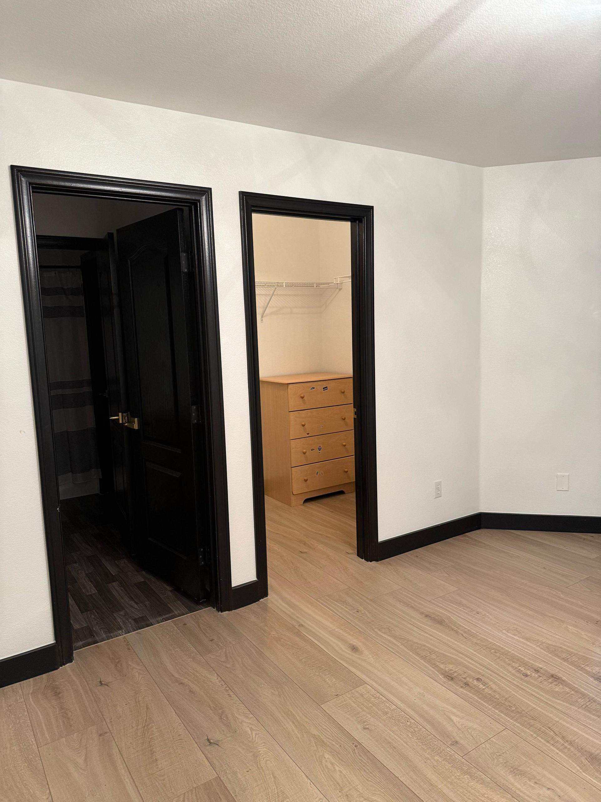 Walk-in-closet with extra storage.