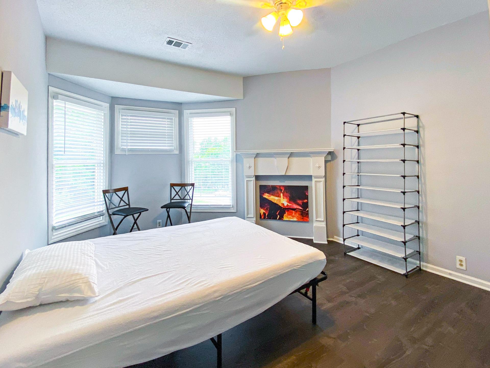 bedroom, detected: ceiling fan, bed, window blind