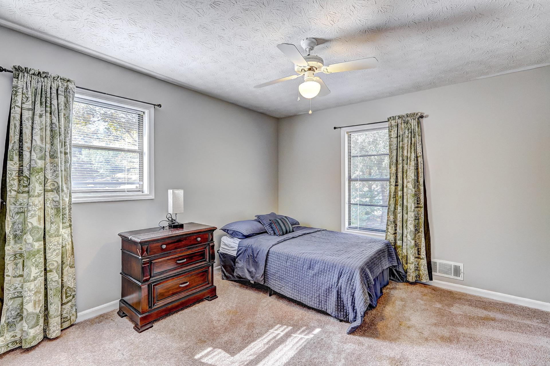 bedroom, detected: ceiling fan, window blind, bed