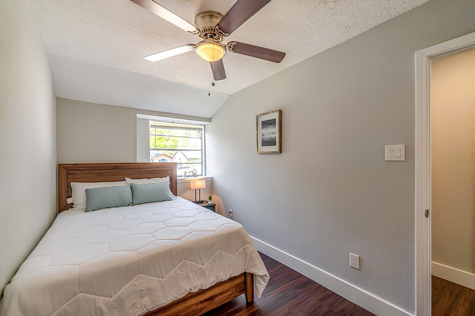 bedroom, detected: ceiling fan, bed, window blind