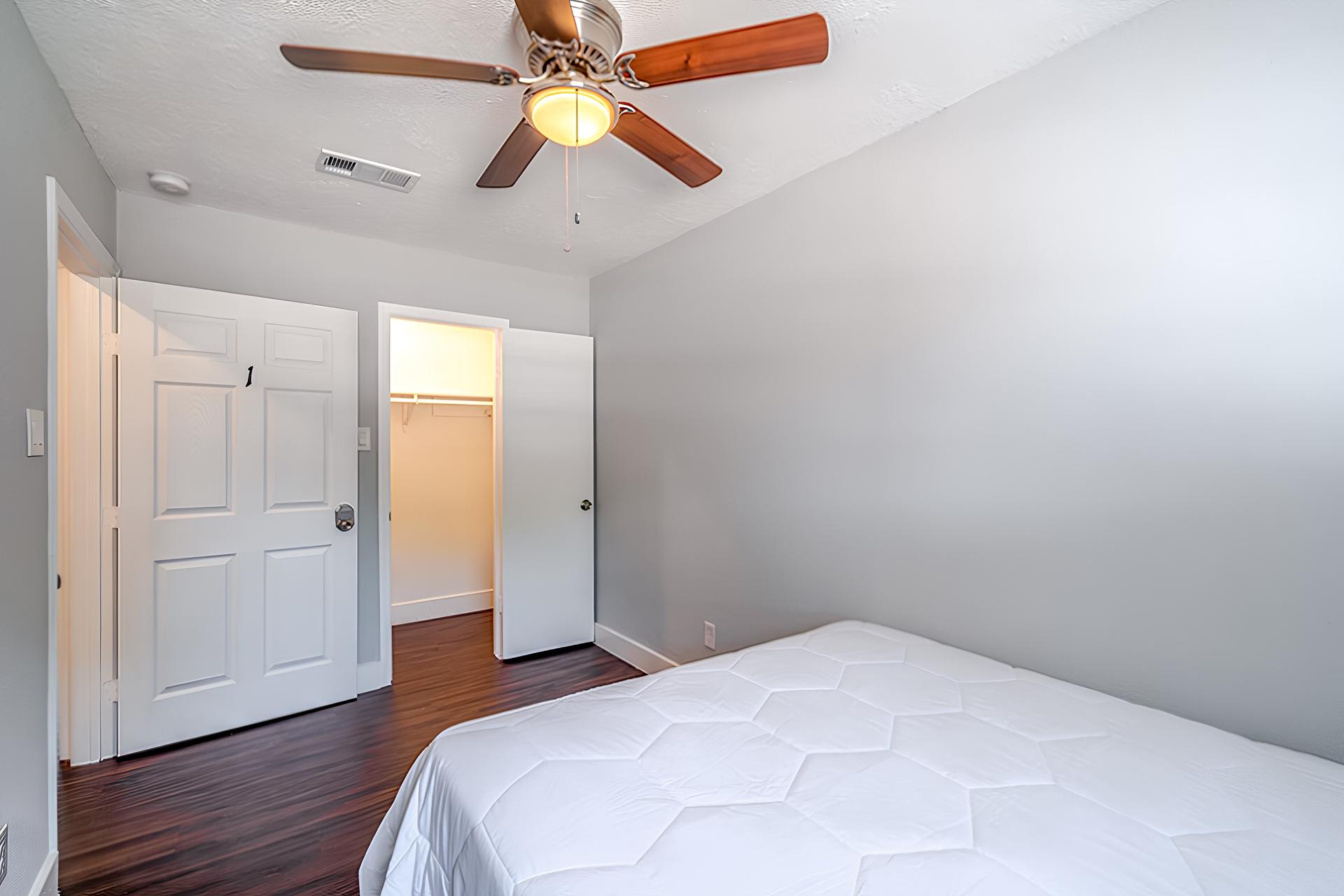 bedroom, detected: ceiling fan, bed, window blind