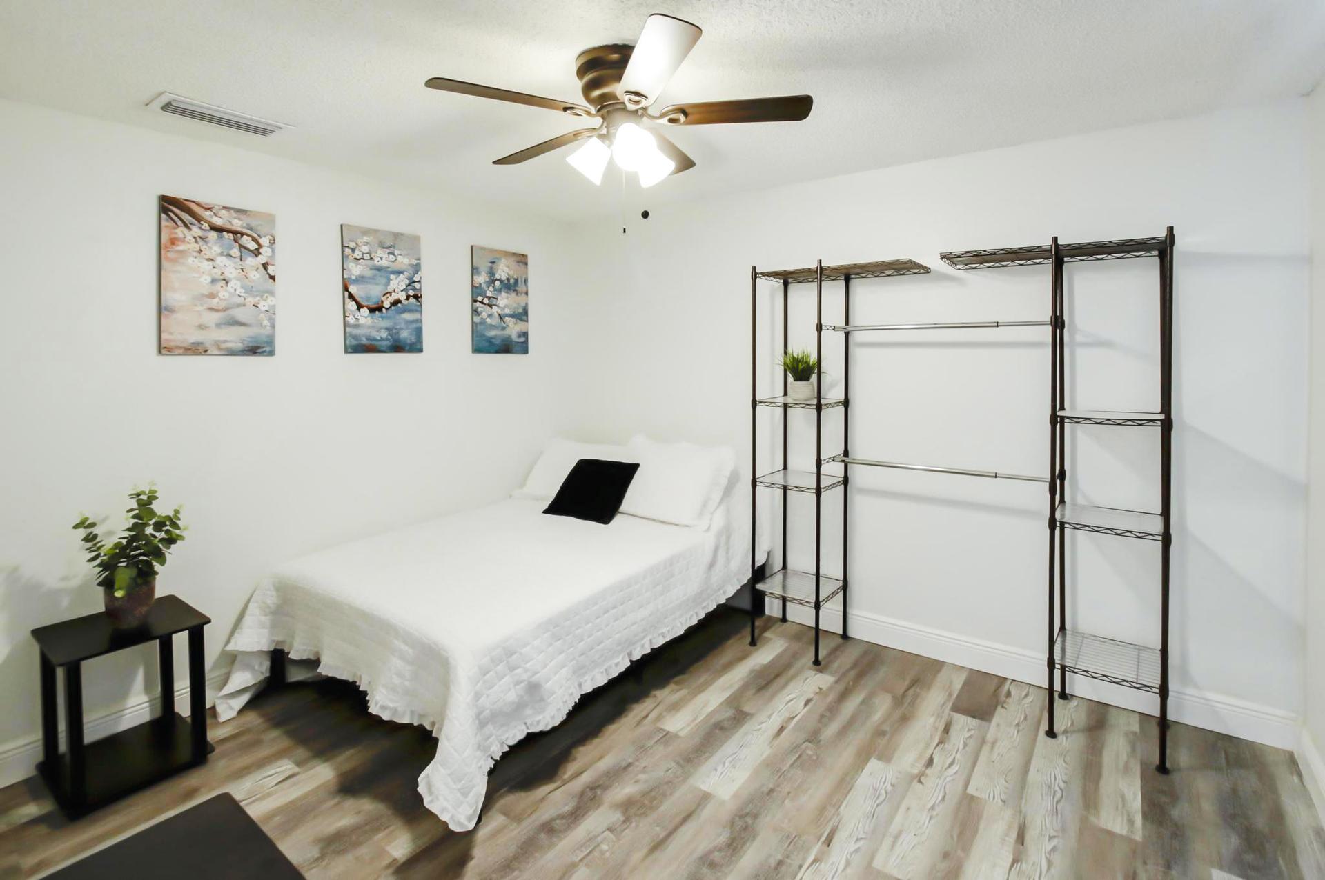 bedroom, detected: ceiling fan, window blind, bed