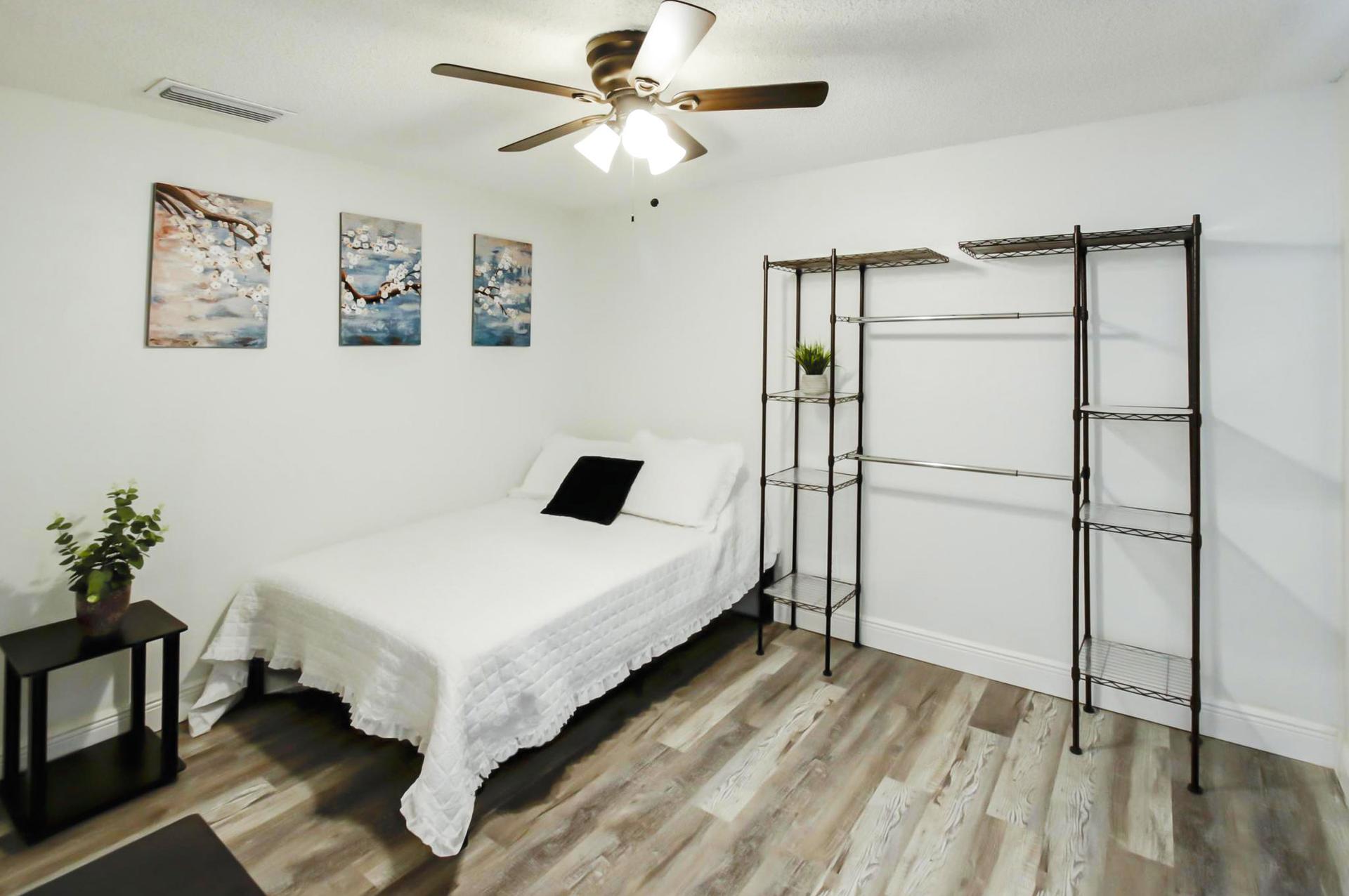 bedroom, detected: ceiling fan, window blind, bed