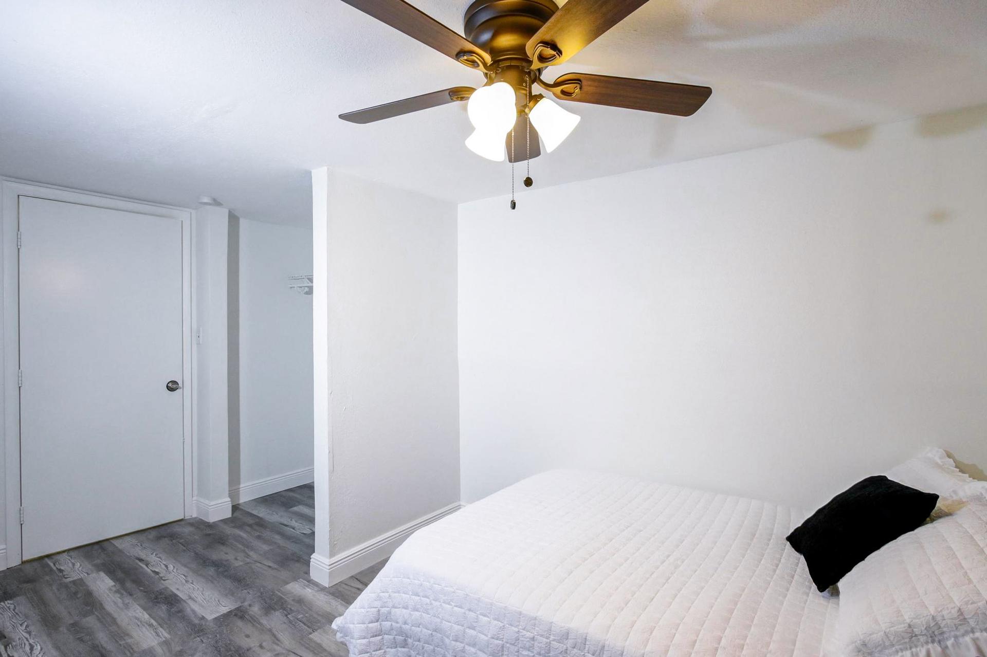 bedroom, detected: ceiling fan, bed, window blind